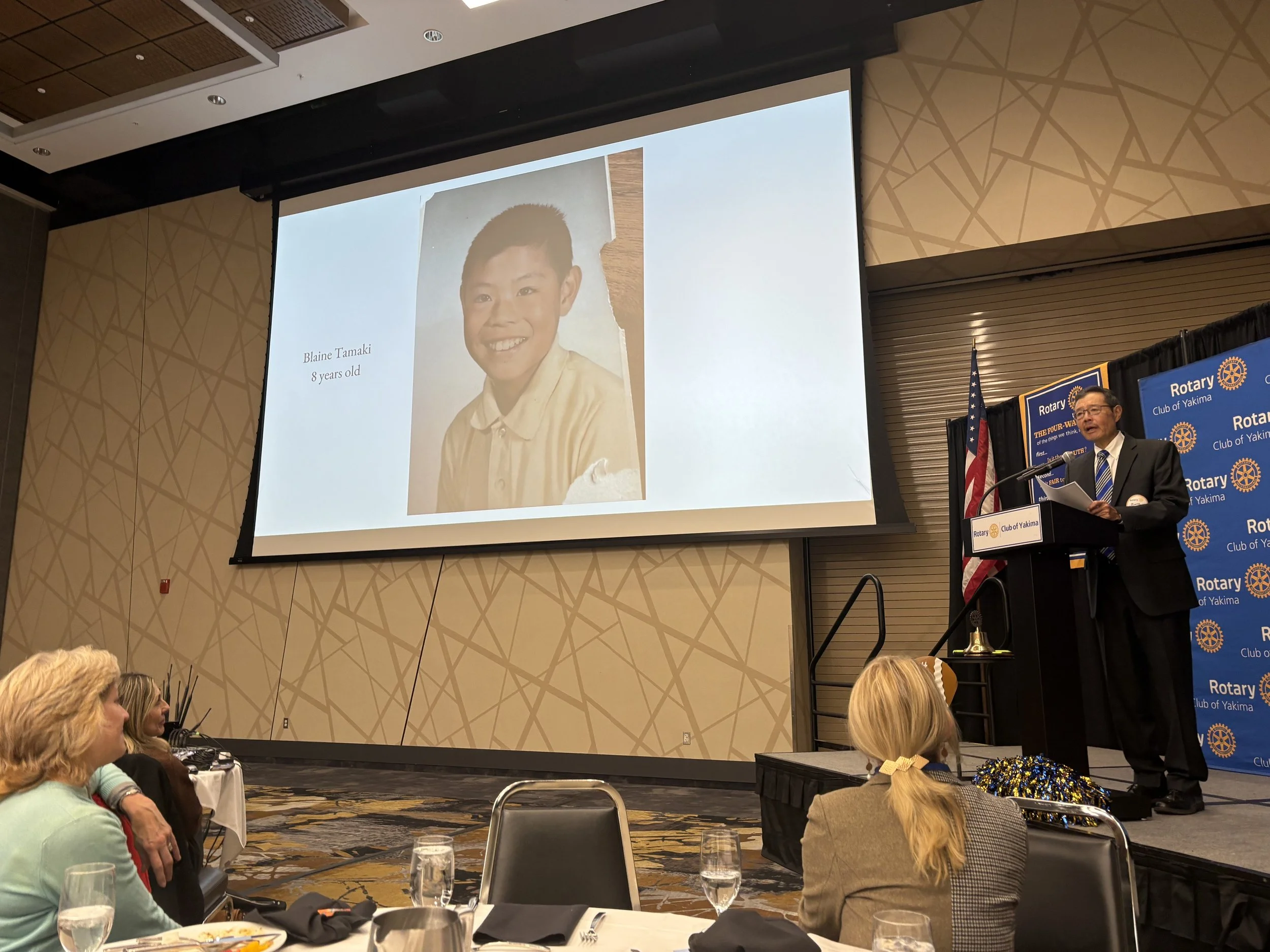 Blaine Tamaki speaks at the Rotary luncheon for the Day of Remembrance