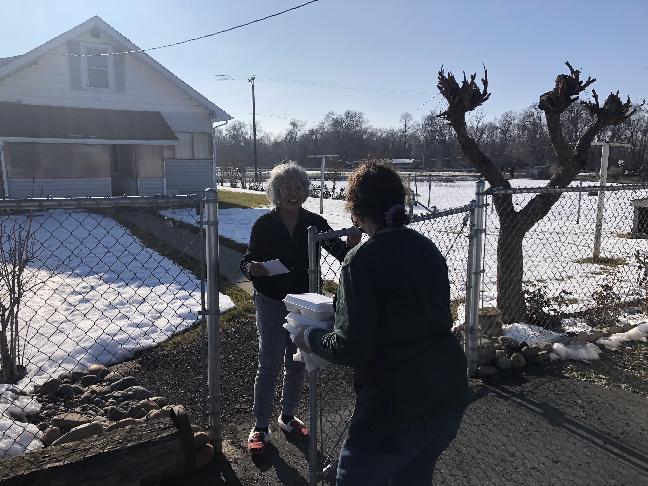 Diana Ibatuan delivers a meal on a snowy day