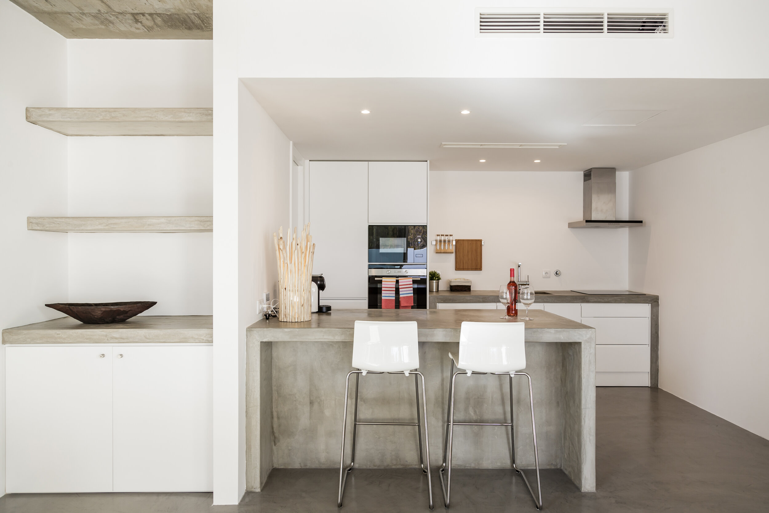 modern-kitchen-with-gray-tile-floor-and-white-wall-P987QD9.jpg