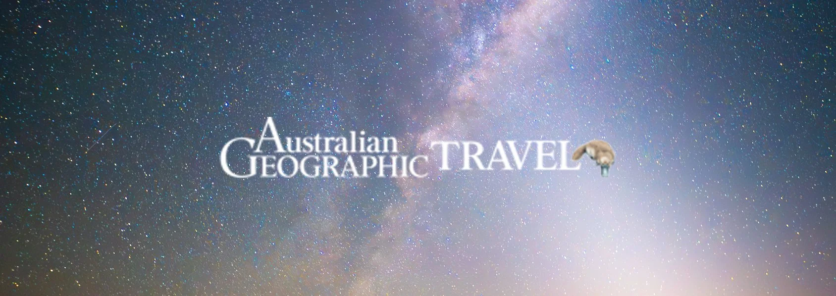 Starry night sky with the Milky Way galaxy and the words 'Australian Geographic Travel' overlayed, along with an illustrated mouse.