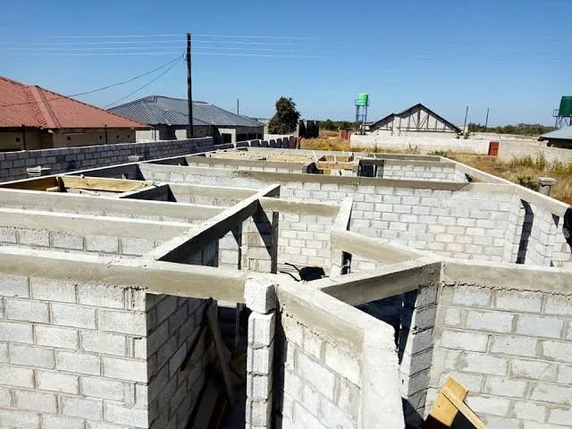 house a blockwork stage with concrete beam on the top of the blocks.