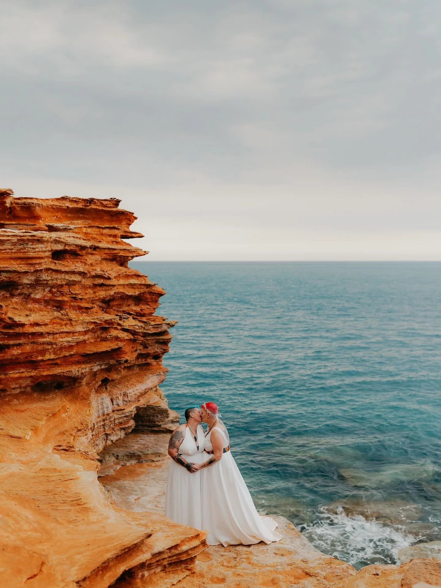 Naomi and Rayella were married in Broome, along the red cliffs. Their day was all kinds of wonderful, a homegrown celebration of love, with every detail made by their own hands, from the food to the decorations. A touch of New Zealand heritage was en