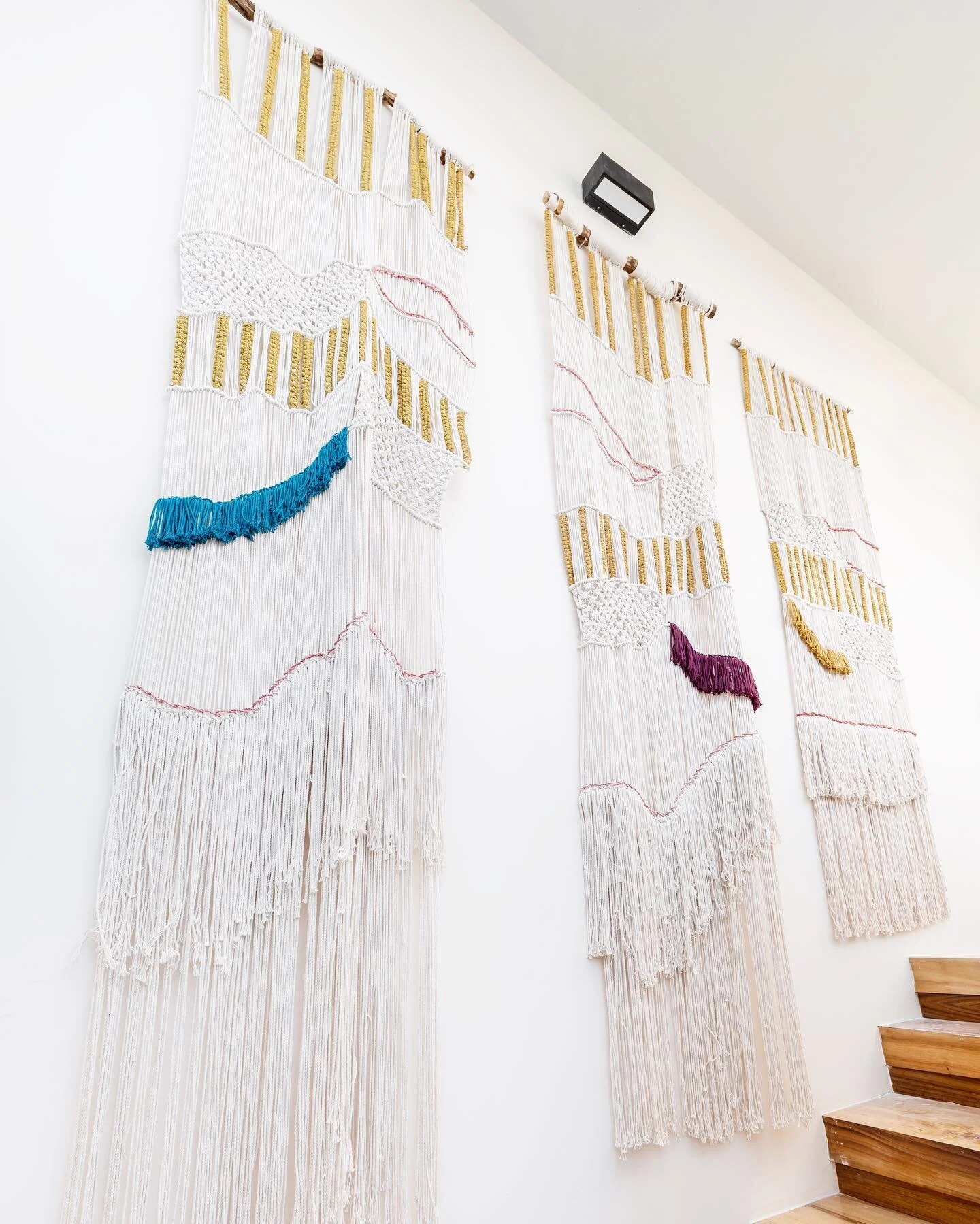 This was the BIGGEST macrame piece that we&rsquo;ve had made yet (the largest one being 2 meters long) and we&rsquo;re so happy with how it added flare to this stairway!✨ Not only does it insulate for sound but it was custom made for the space and 