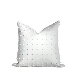 no saint white faux leather pillow