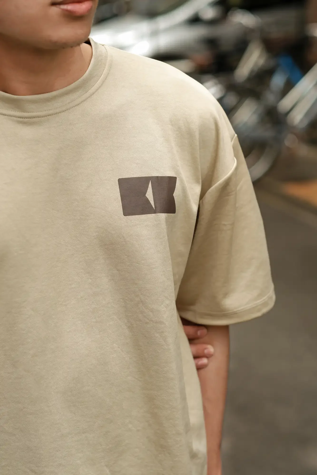 Rakken Coffee Merch -- Cream Tee - look