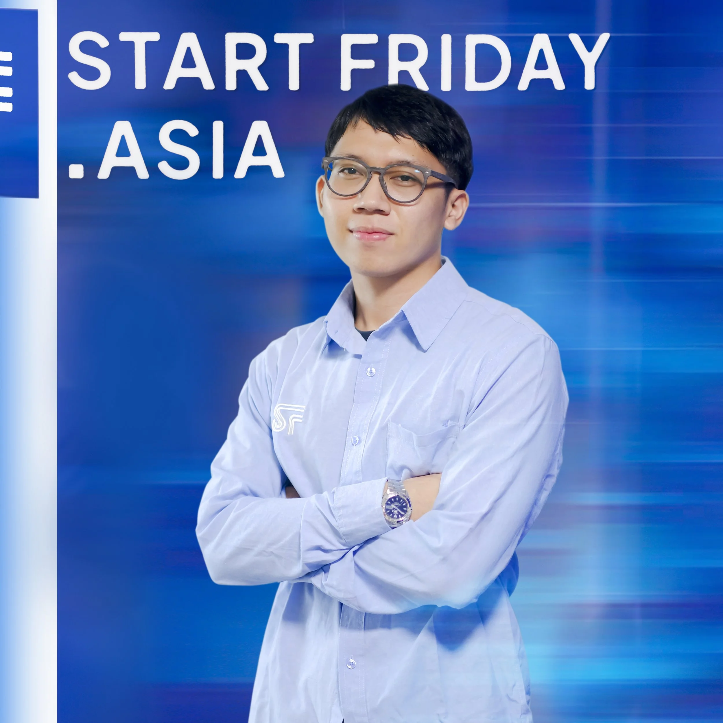 Young man in glasses and a blue shirt standing with arms crossed in front of a blue background with "START FRIDAY .ASIA" text.