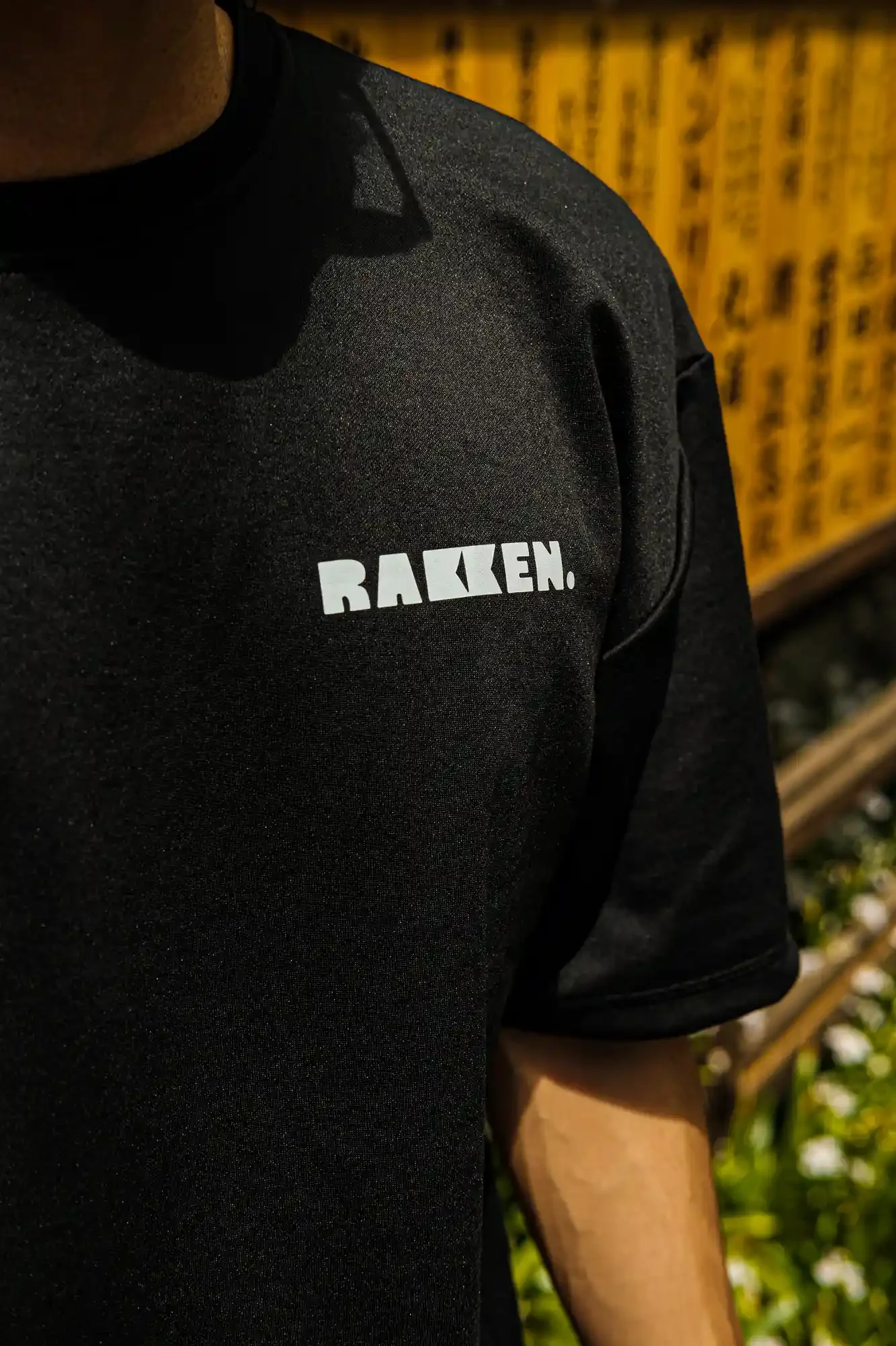 Rakken Coffee Merch -- Black Tee - look