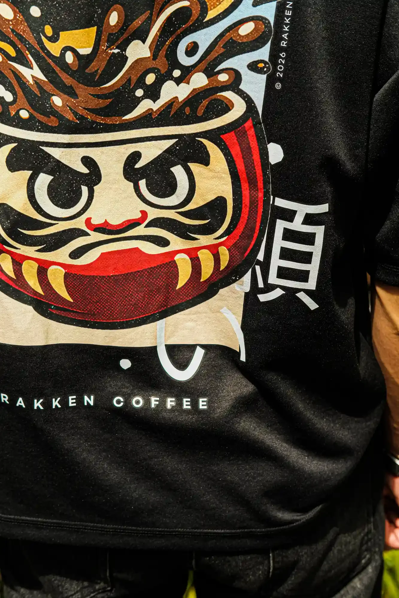 Rakken Coffee Merch -- Black Tee - look