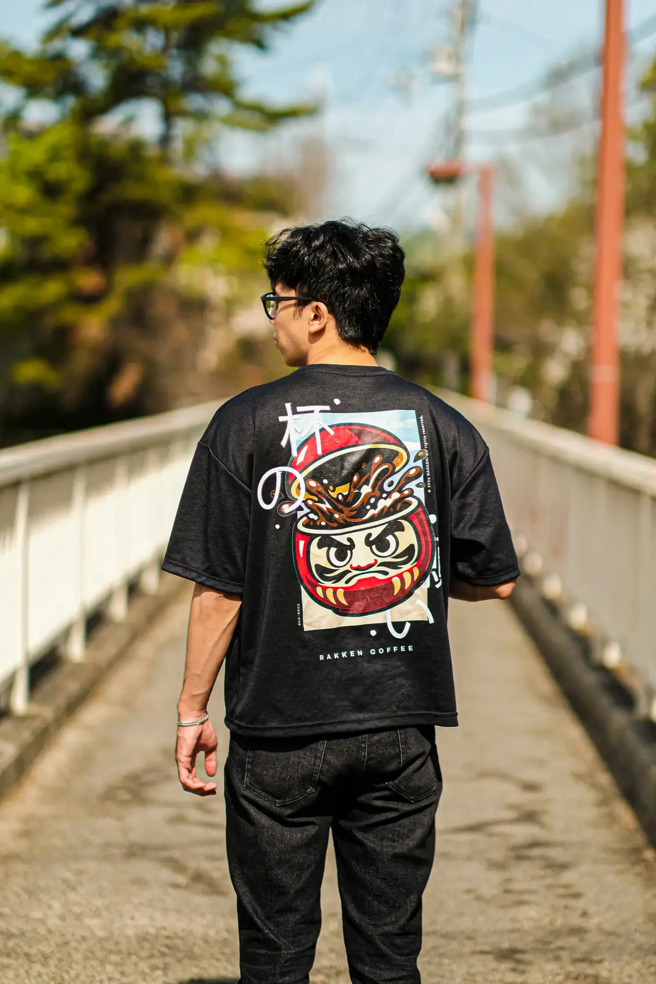 Rakken Coffee Merch -- Black Tee - look