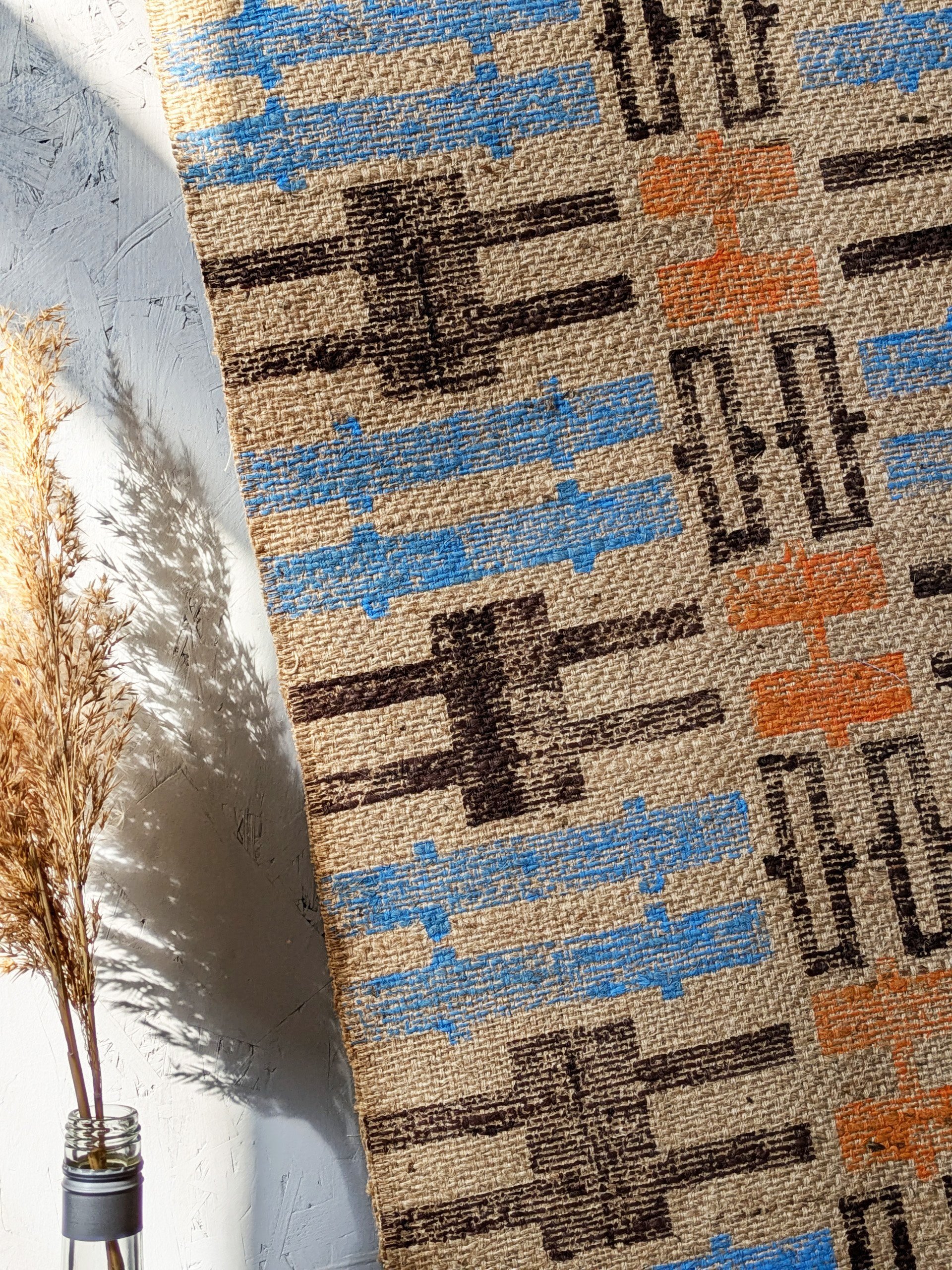 details of handmade block printed jute rugs in geometric pattern design
