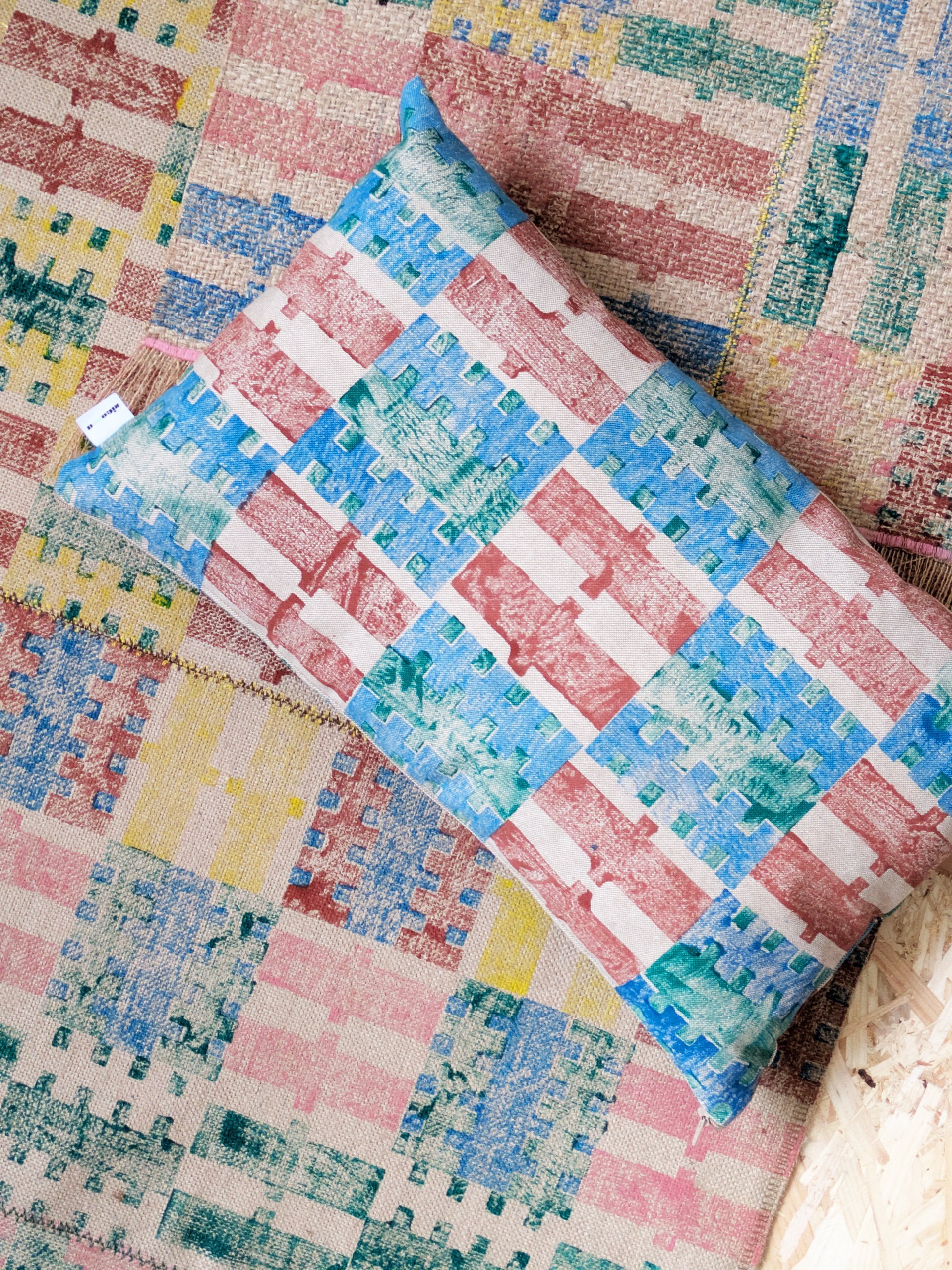 coastal-inspired summery stripe pattern on block printed cushion and rug