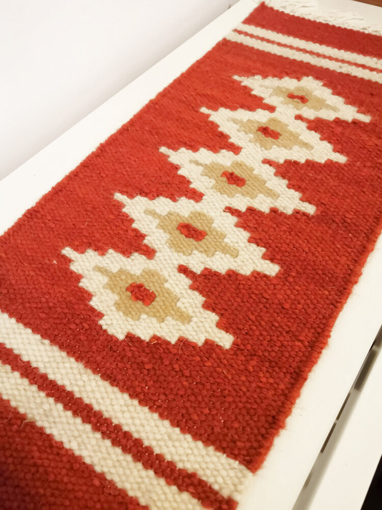 red-diamond-pattern-wool-rug.jpg
