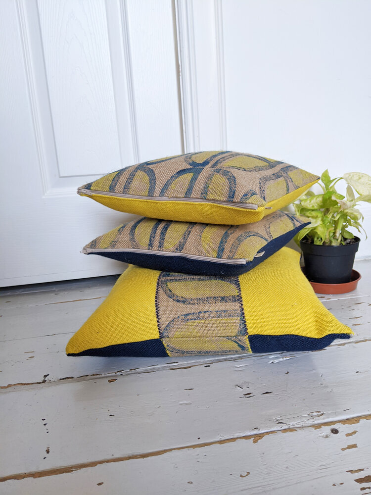 yellow-remnant-cushions-navy-tulip-retro-design.jpg