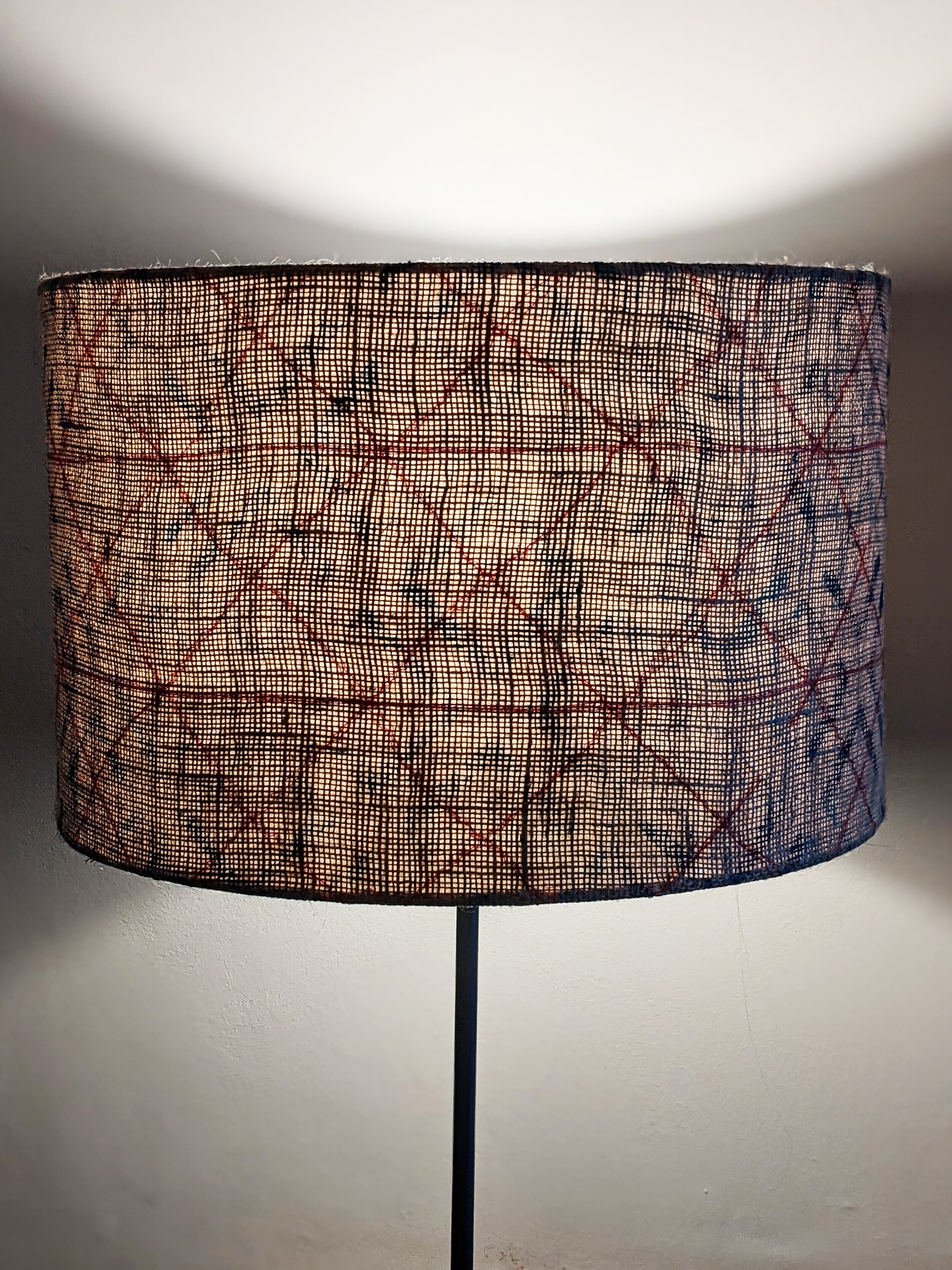 SOROMPÓ blue printed jute lampshade - stitched texture illuminated with shadows