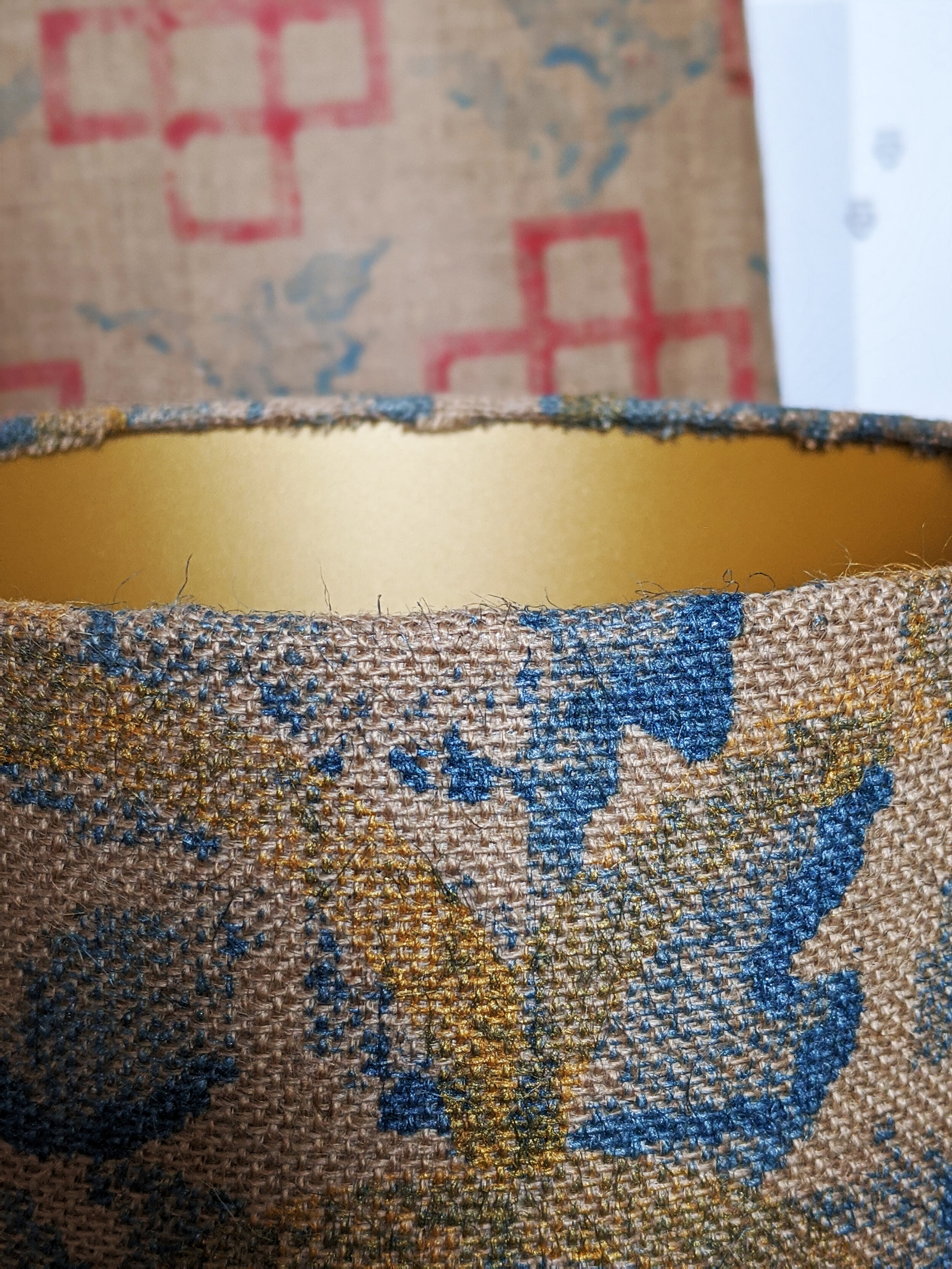 LUGAS gold lined lampshade with blue leaf and golden scallop print design