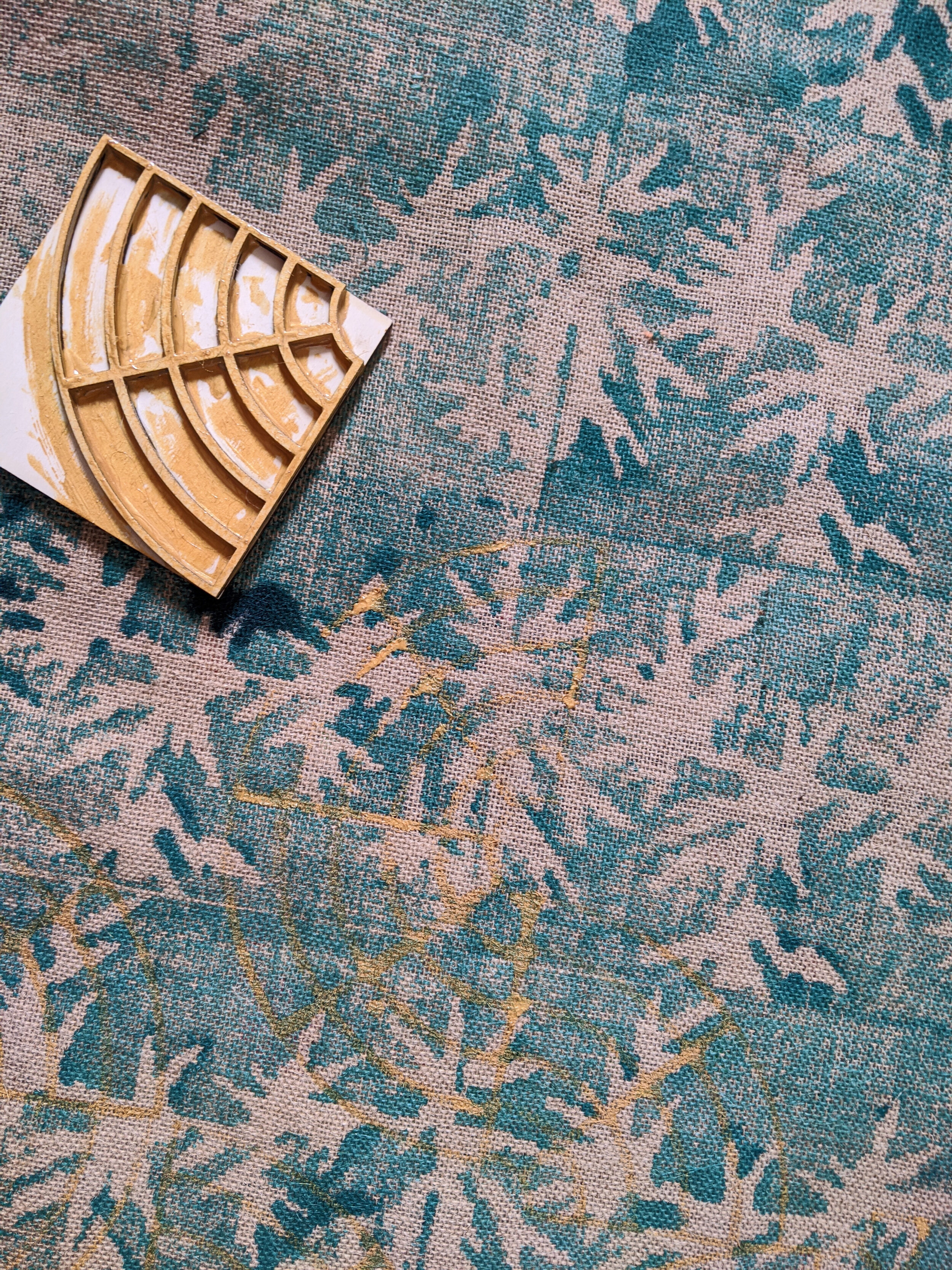HERITAGE block printed fabric in green palm leaf print and golden geometric layer