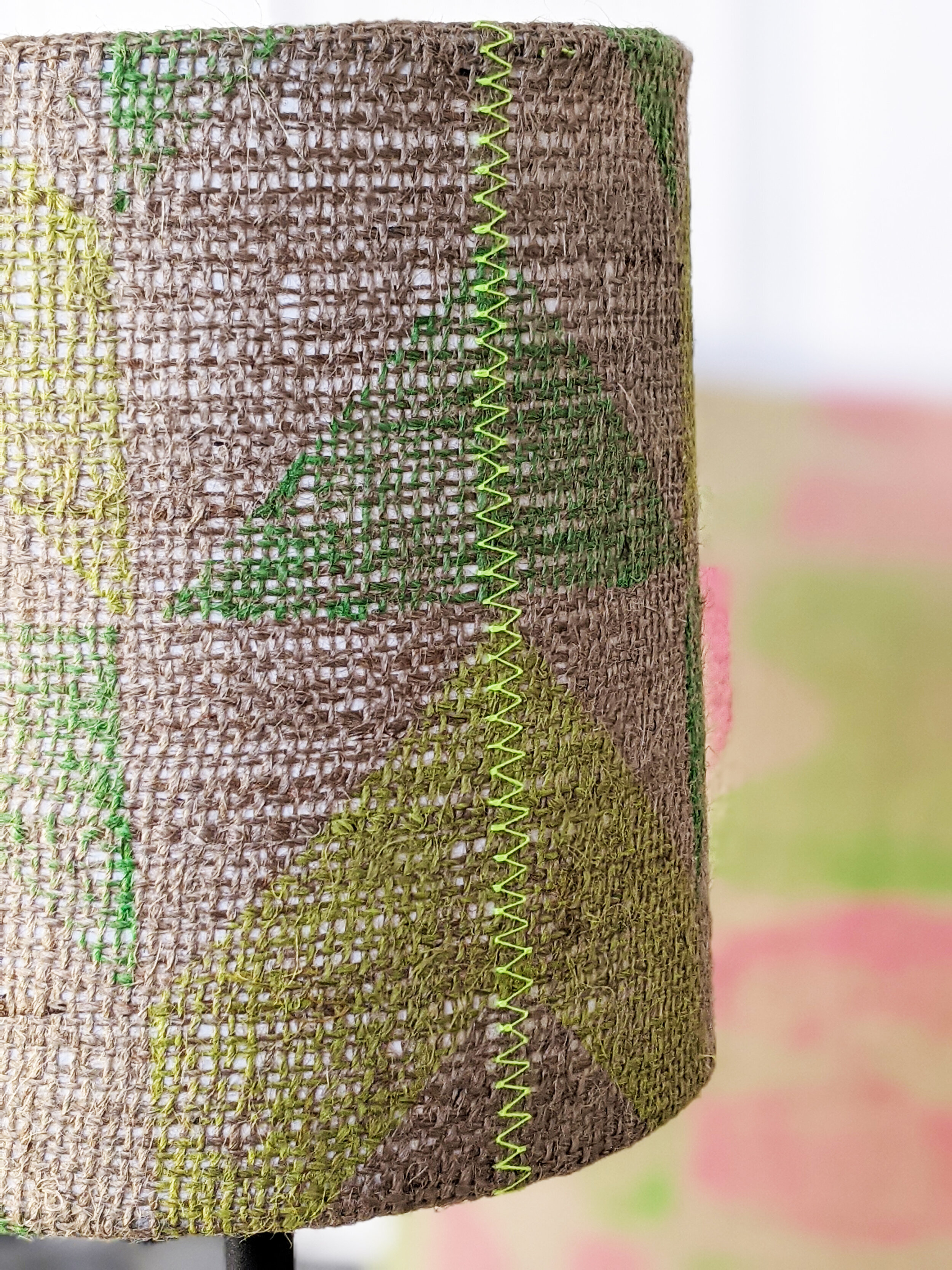 SOROMPÓ hessian lampshade with neon yellow zigzag stitch close-up detail of geometric block printed chevron pattern