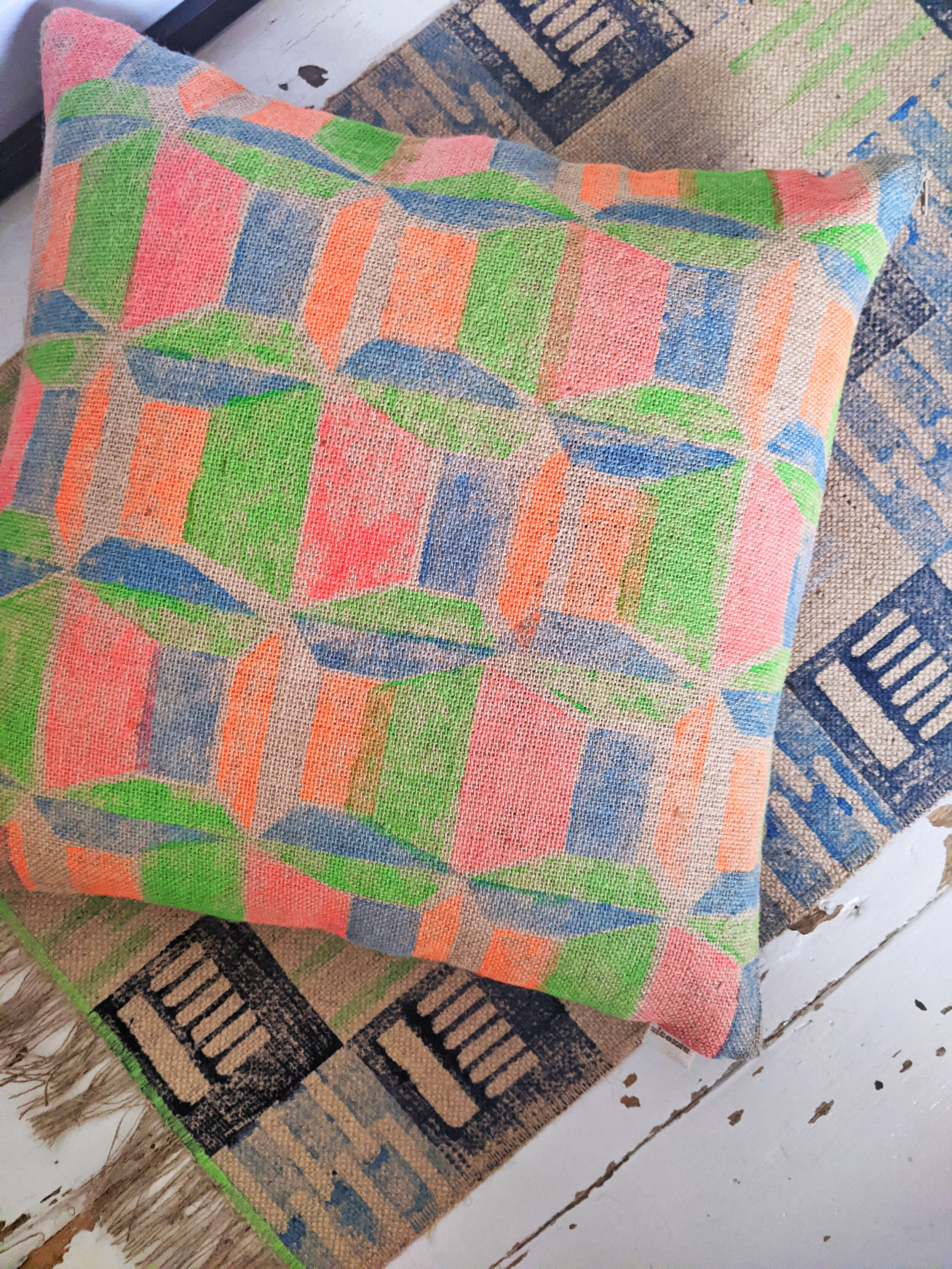 ABLAK square cushion hand block printed in bright colours in architectural inspired geometric pattern