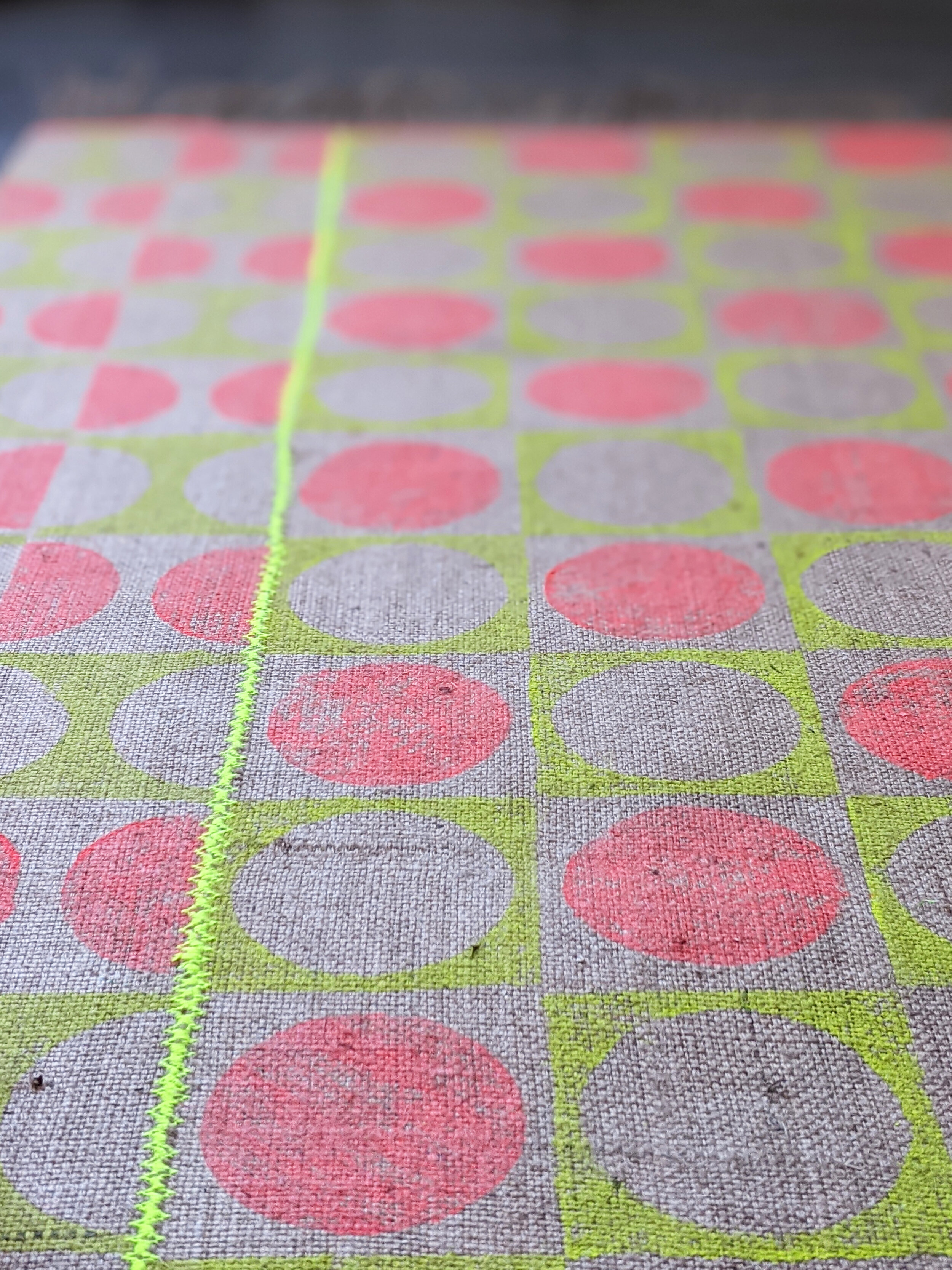 geometric modern rug with geometric luminous print and neon contrast stitch