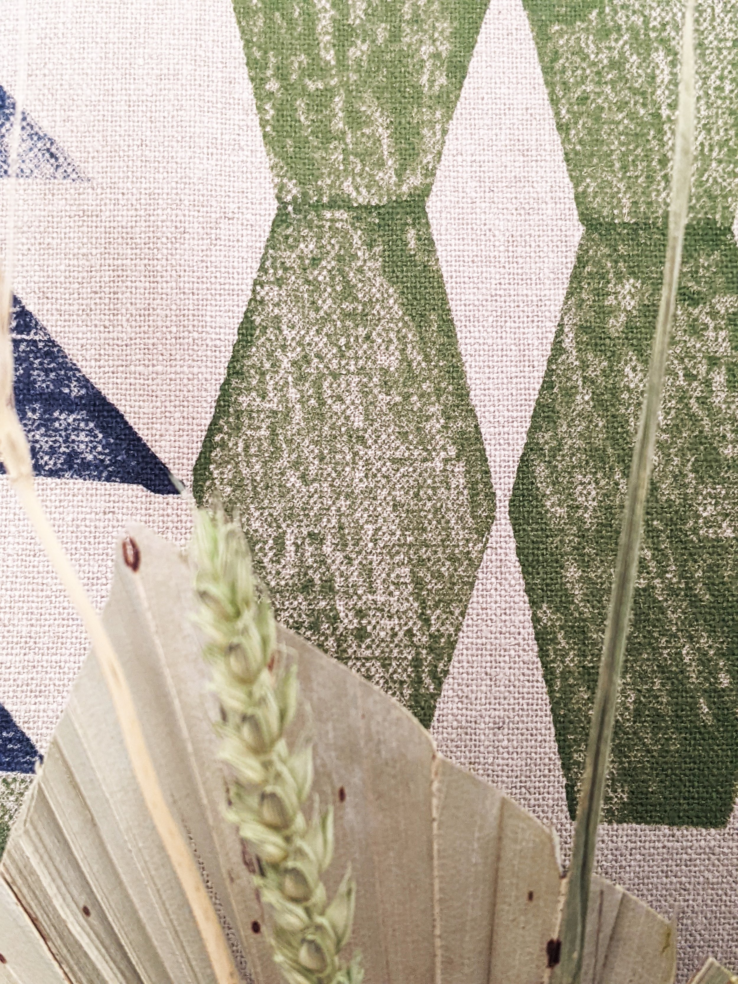 close-up detail of geometric printed texture on recycled linen cushion