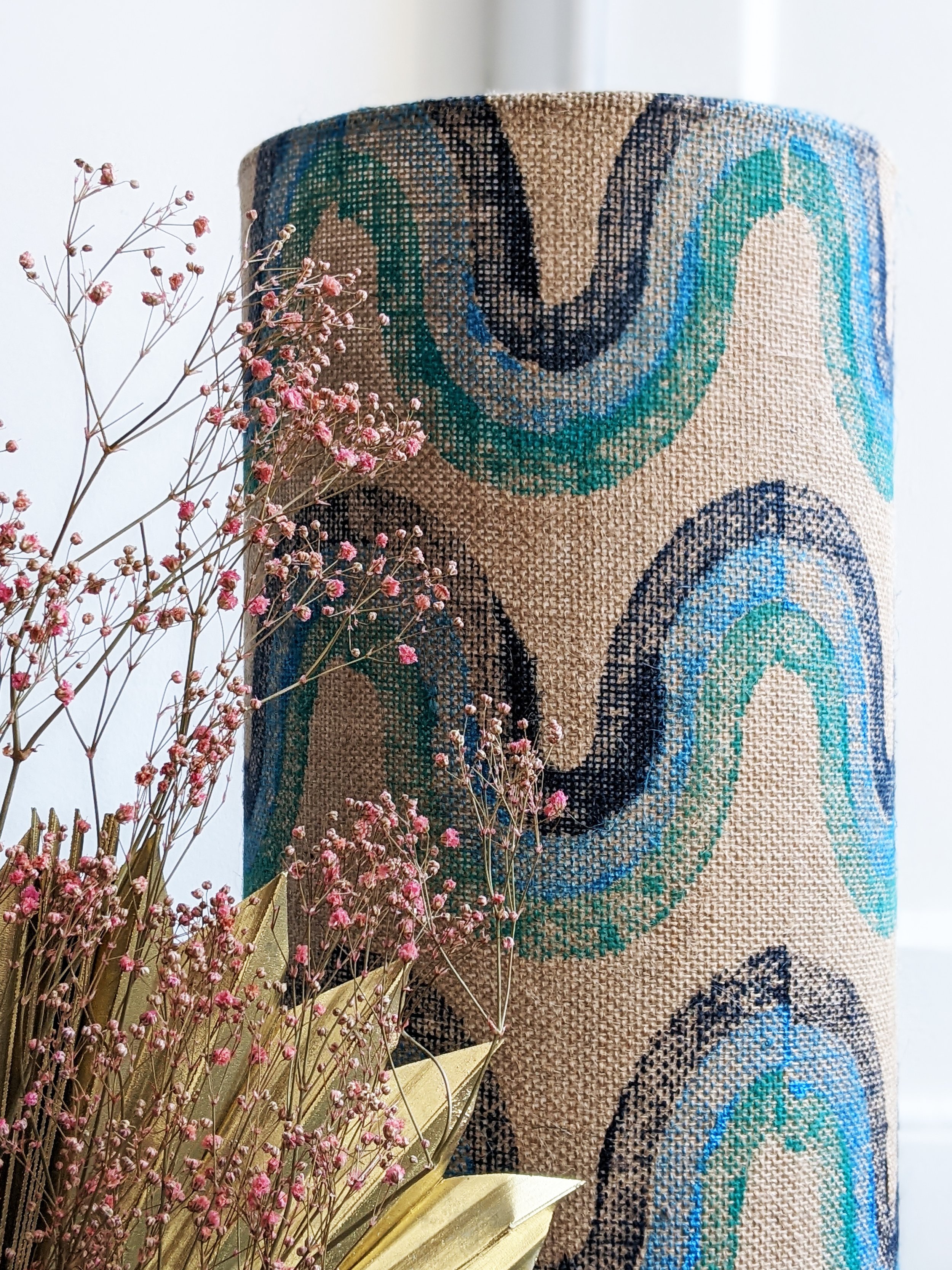 close-up detail of 1970s retro inspired wave print on natural jute lampshade