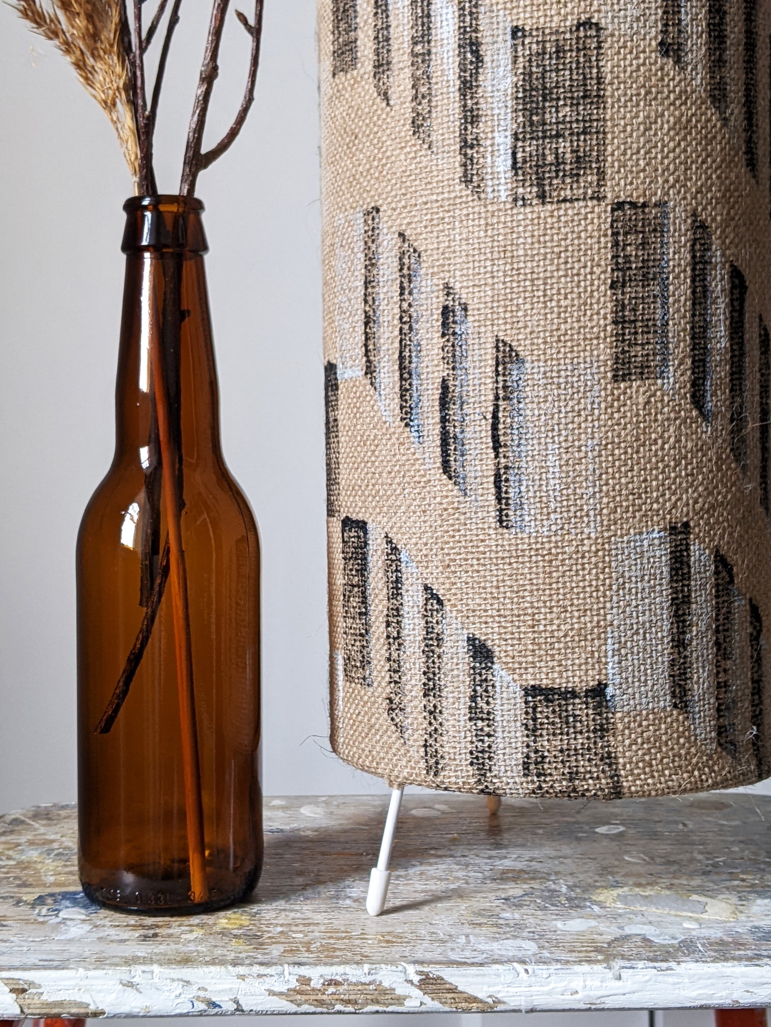close-up detail of architectural pattern in black and white geometry on natural jute rustic floor lamp