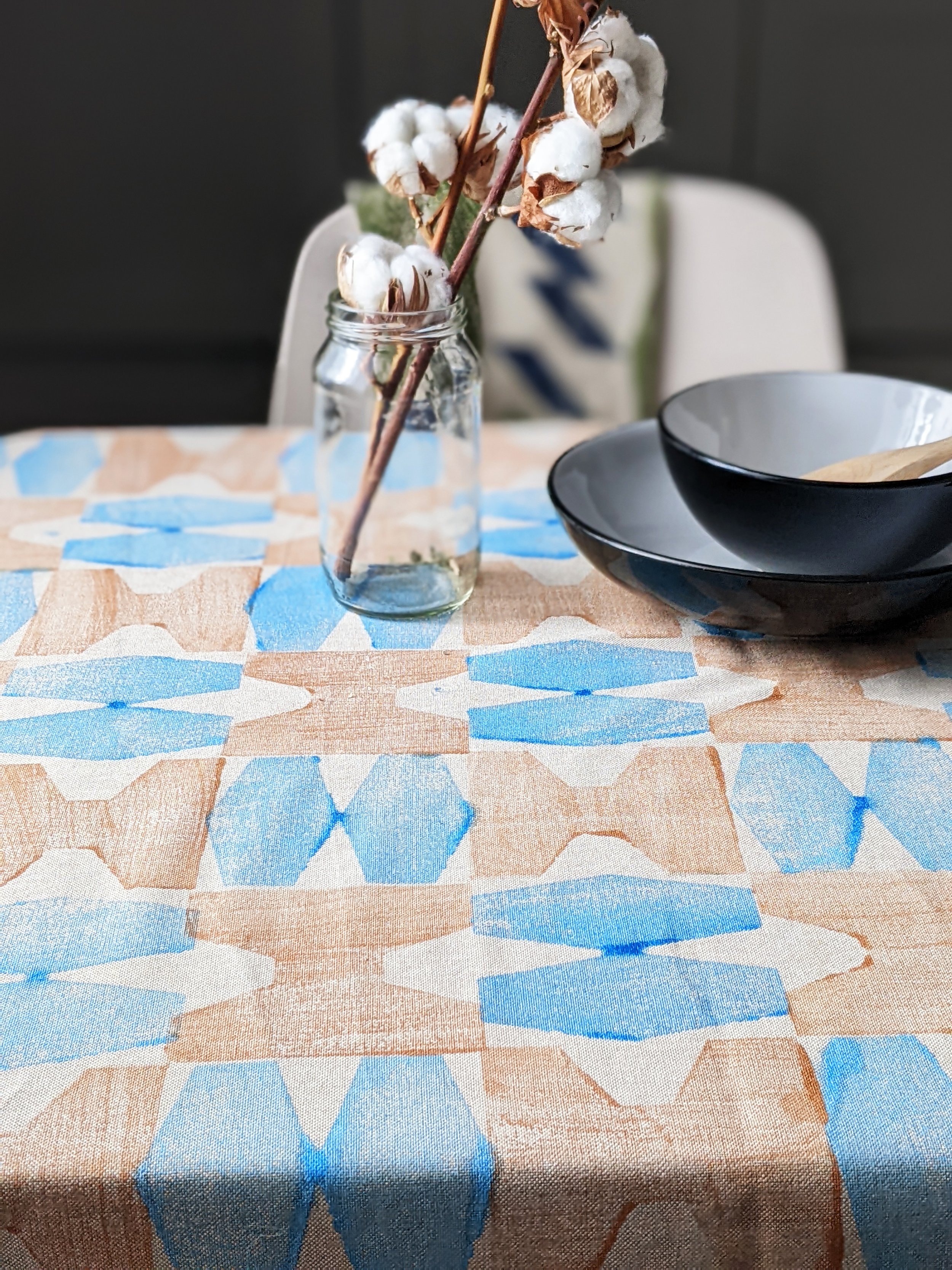 bright kitchen with geometric table cloth