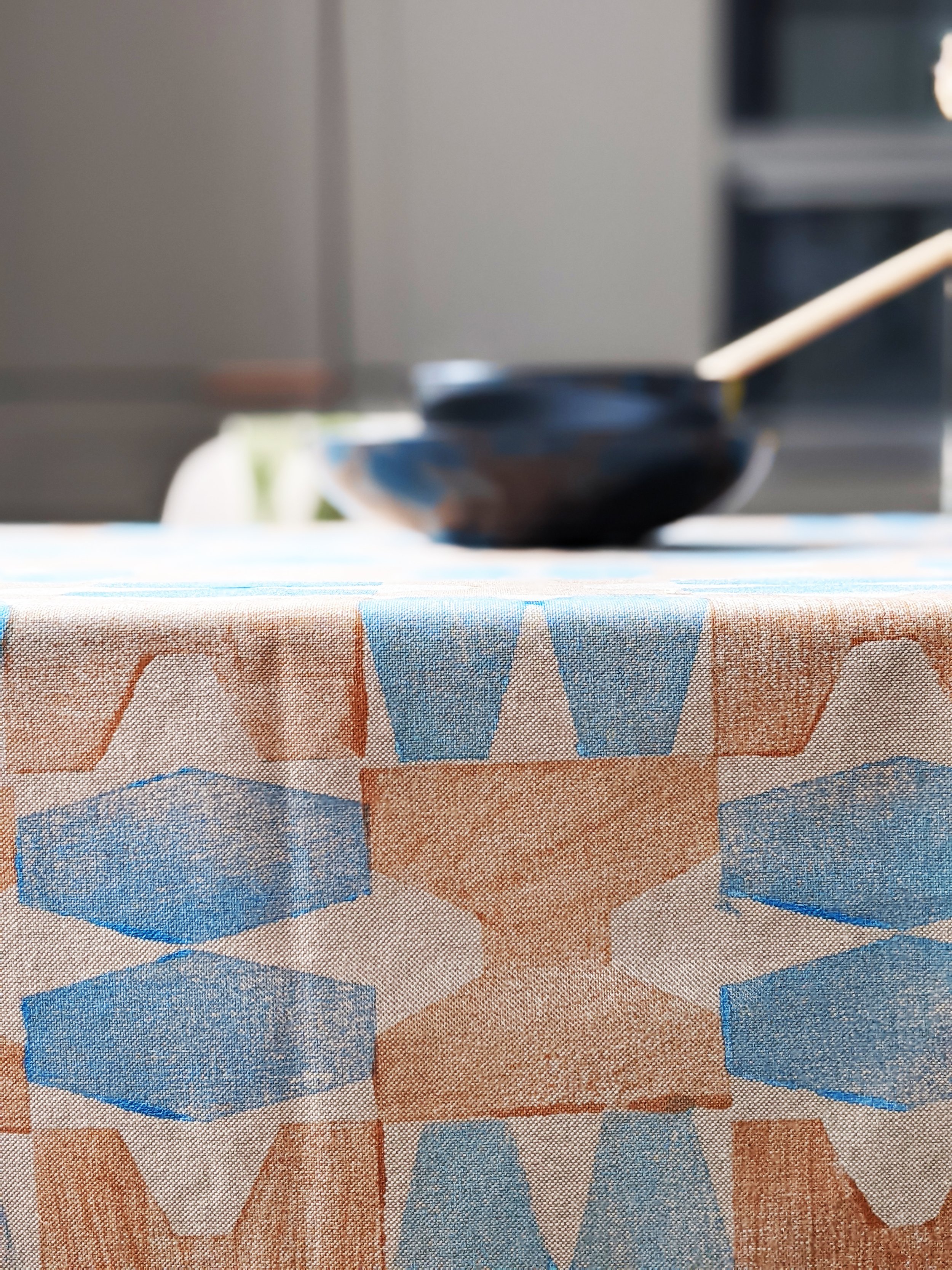 hand printed detail on geometric hand block printed table cloth in kitchen