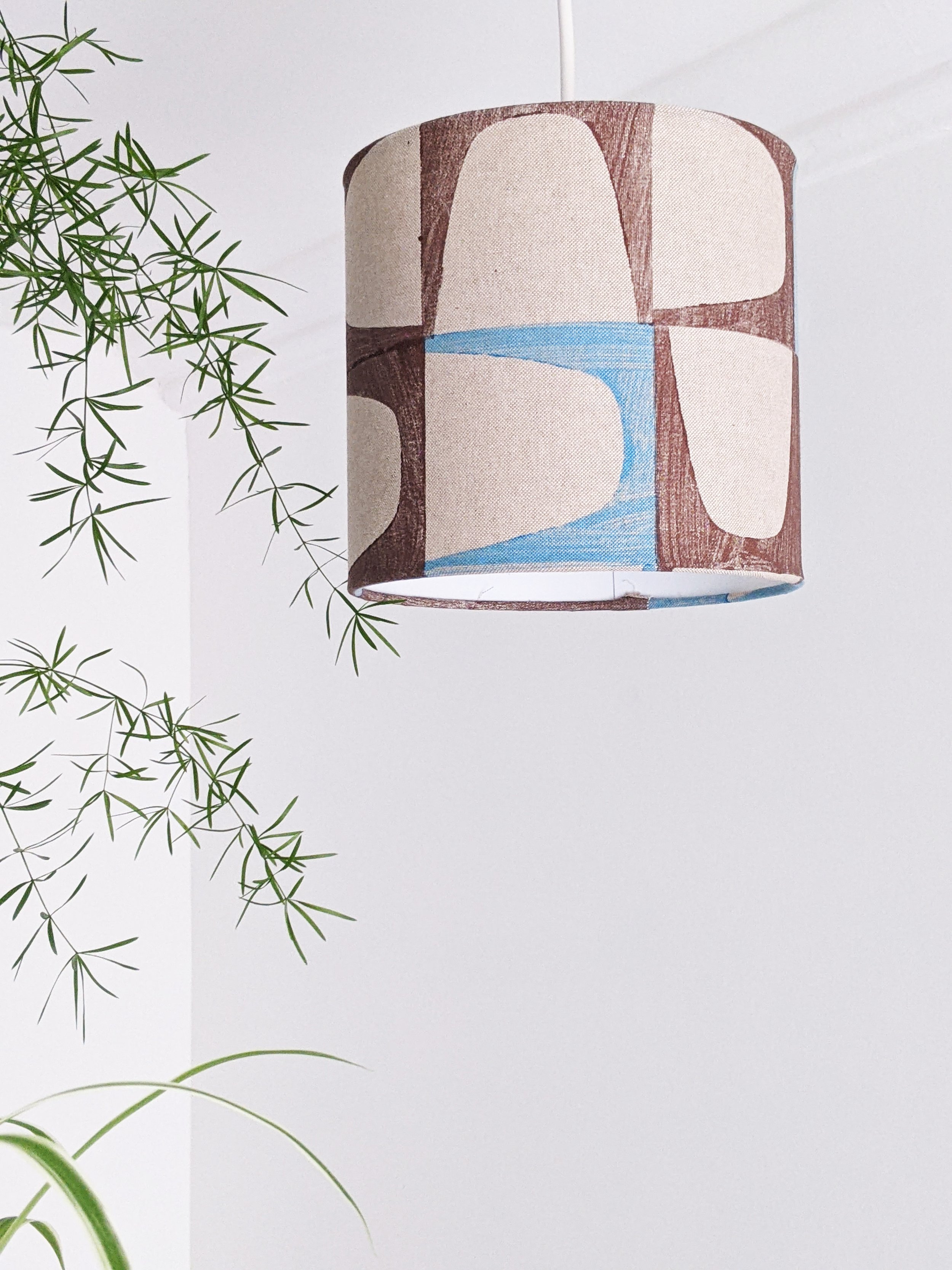 modernist print on lampshade in bright interior