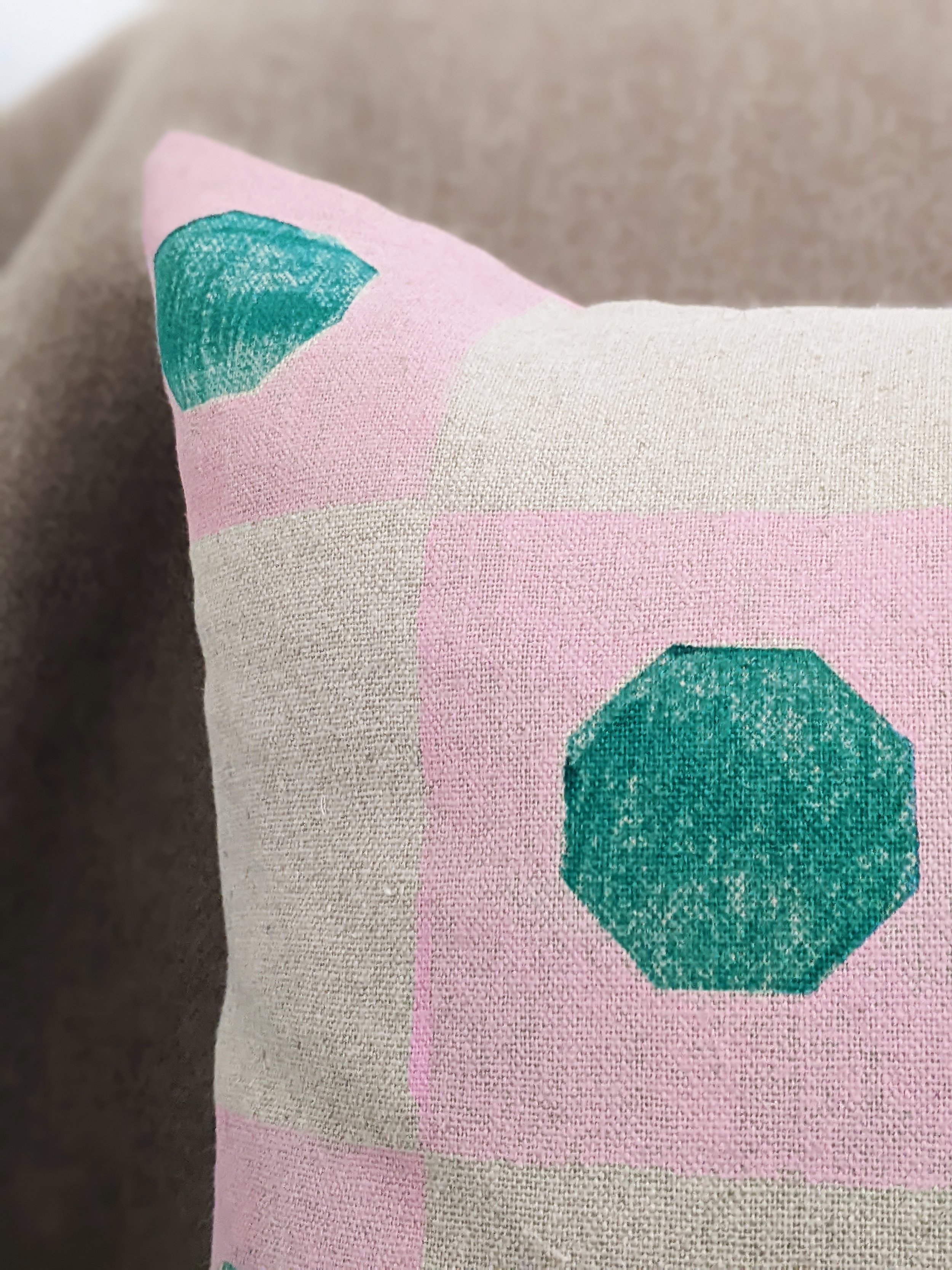 close-up detail of hand block printed design of cushion