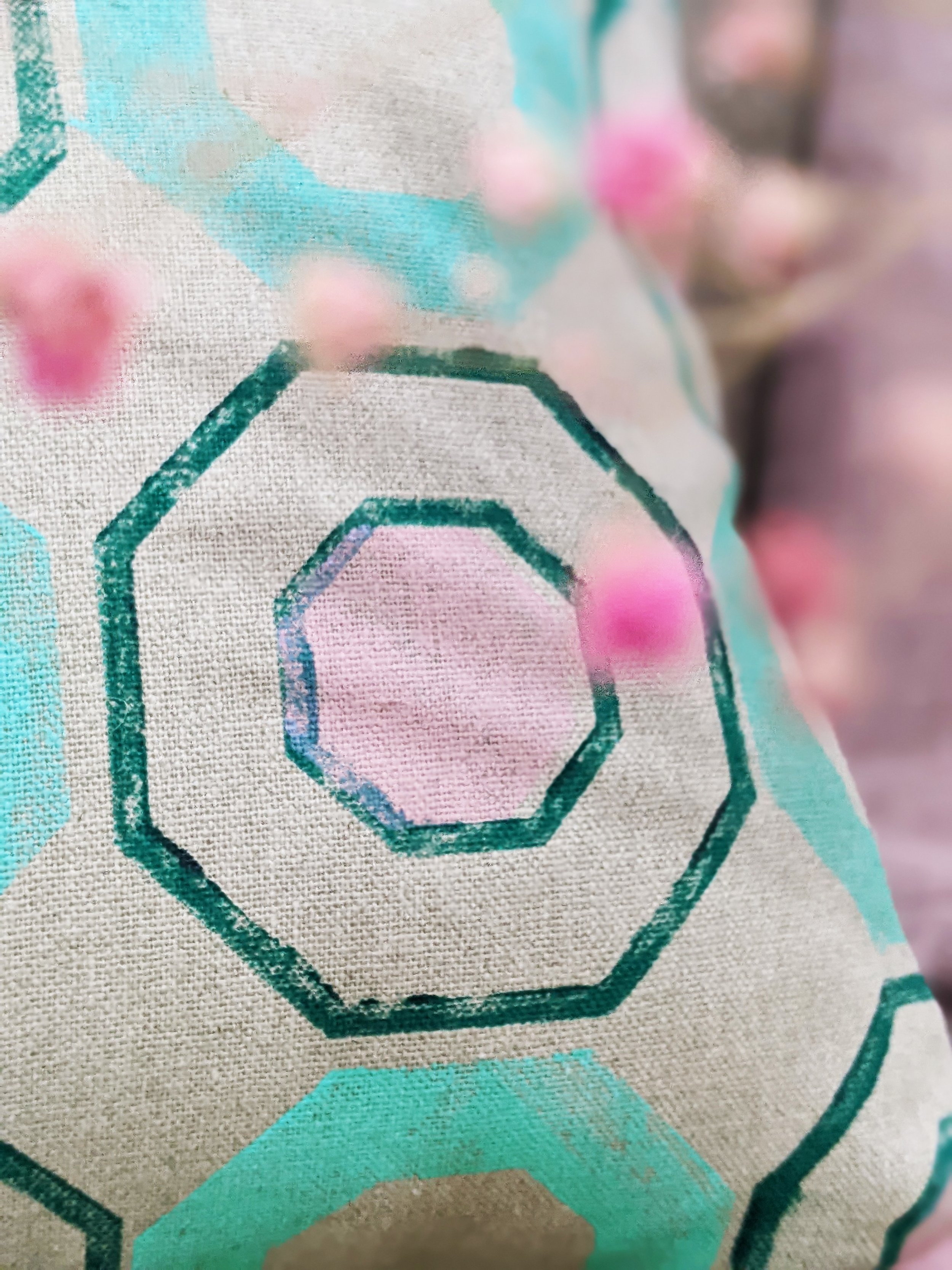 close-up detail of tile print on luxury linen cushion
