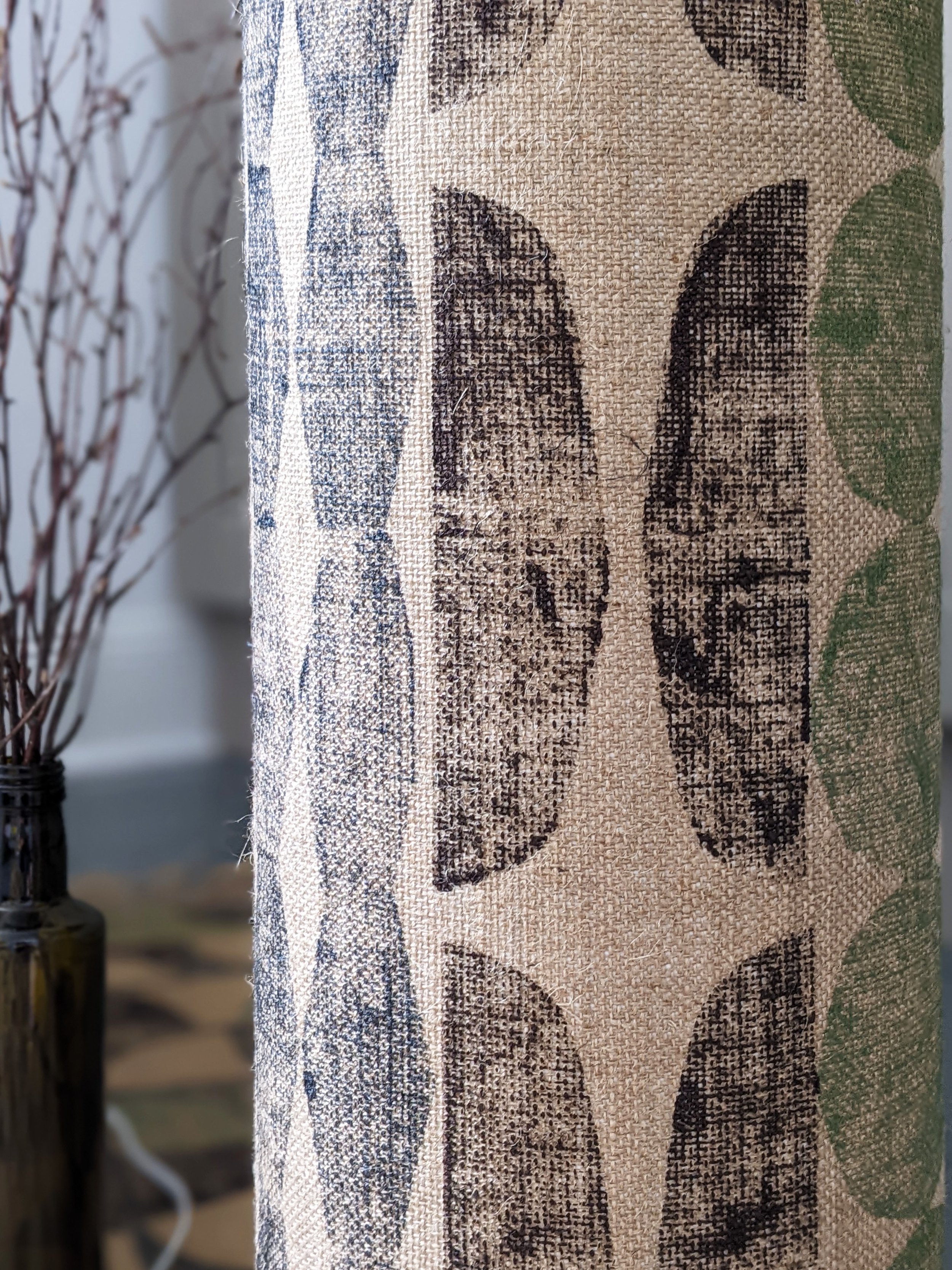 close-up detail of block printed modernist geometric pattern on jute lamp