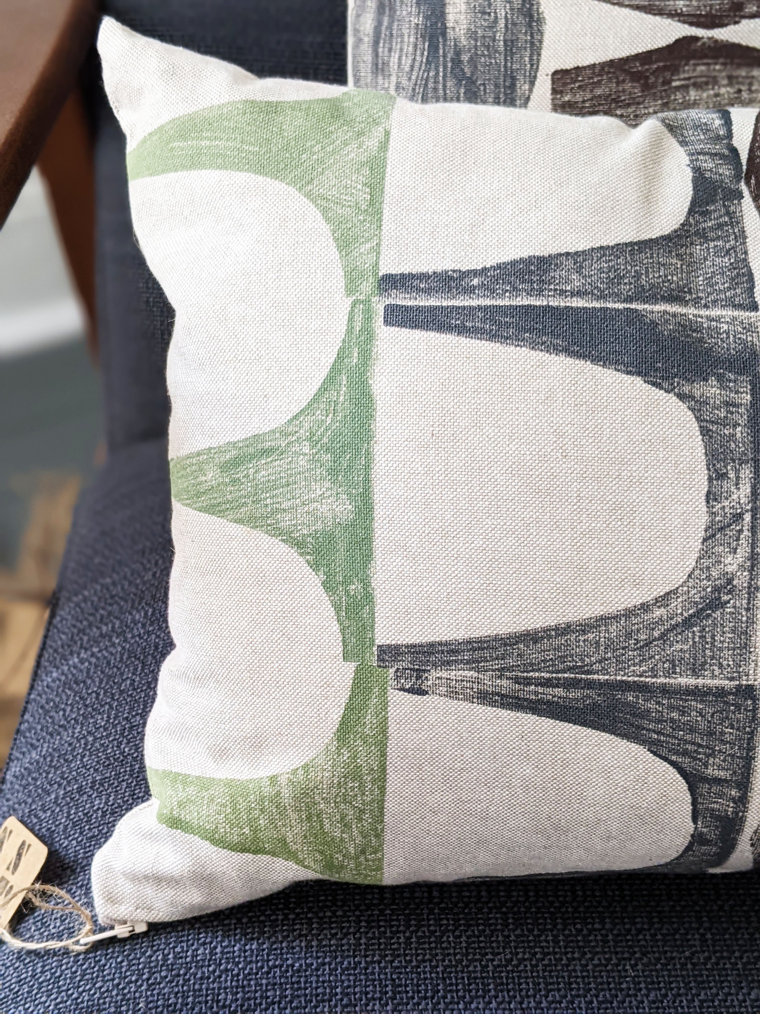 close-up details of hand block printed pattern on rectangular cushion