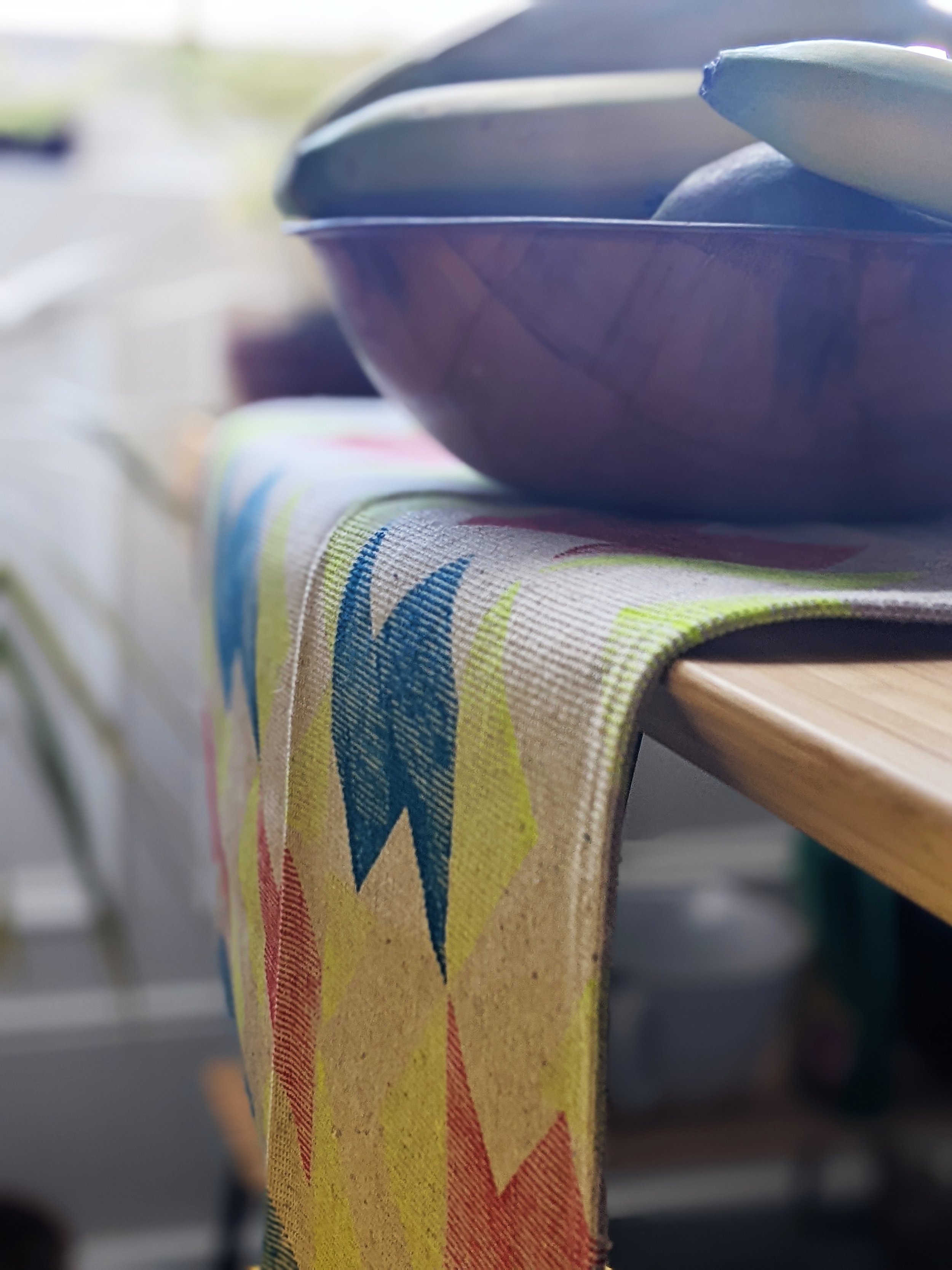 kitchen scene with close-up detail of printed teatowel