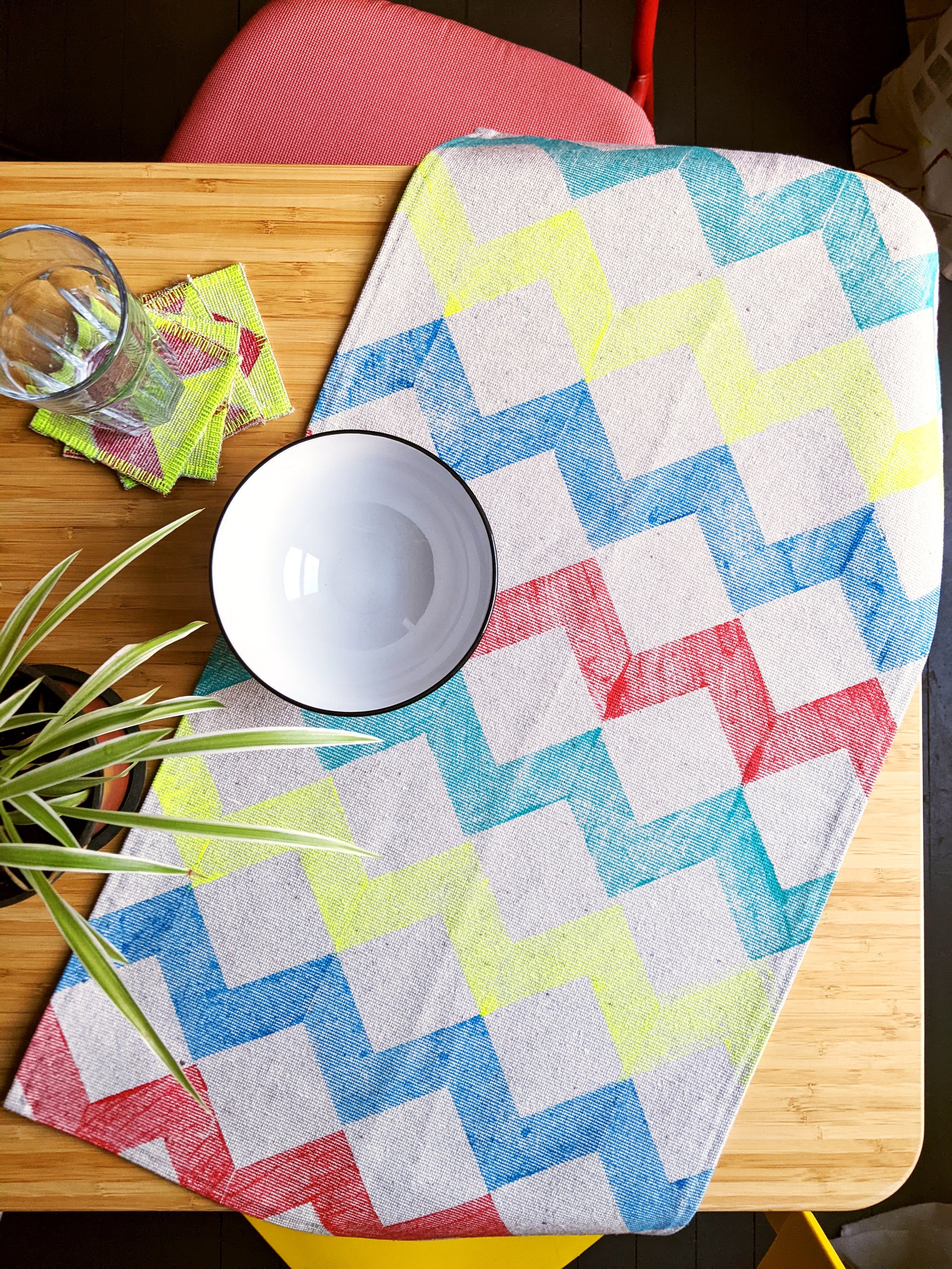 bright kitchen decor scene with zigzag striped colourful kitchen towel on table