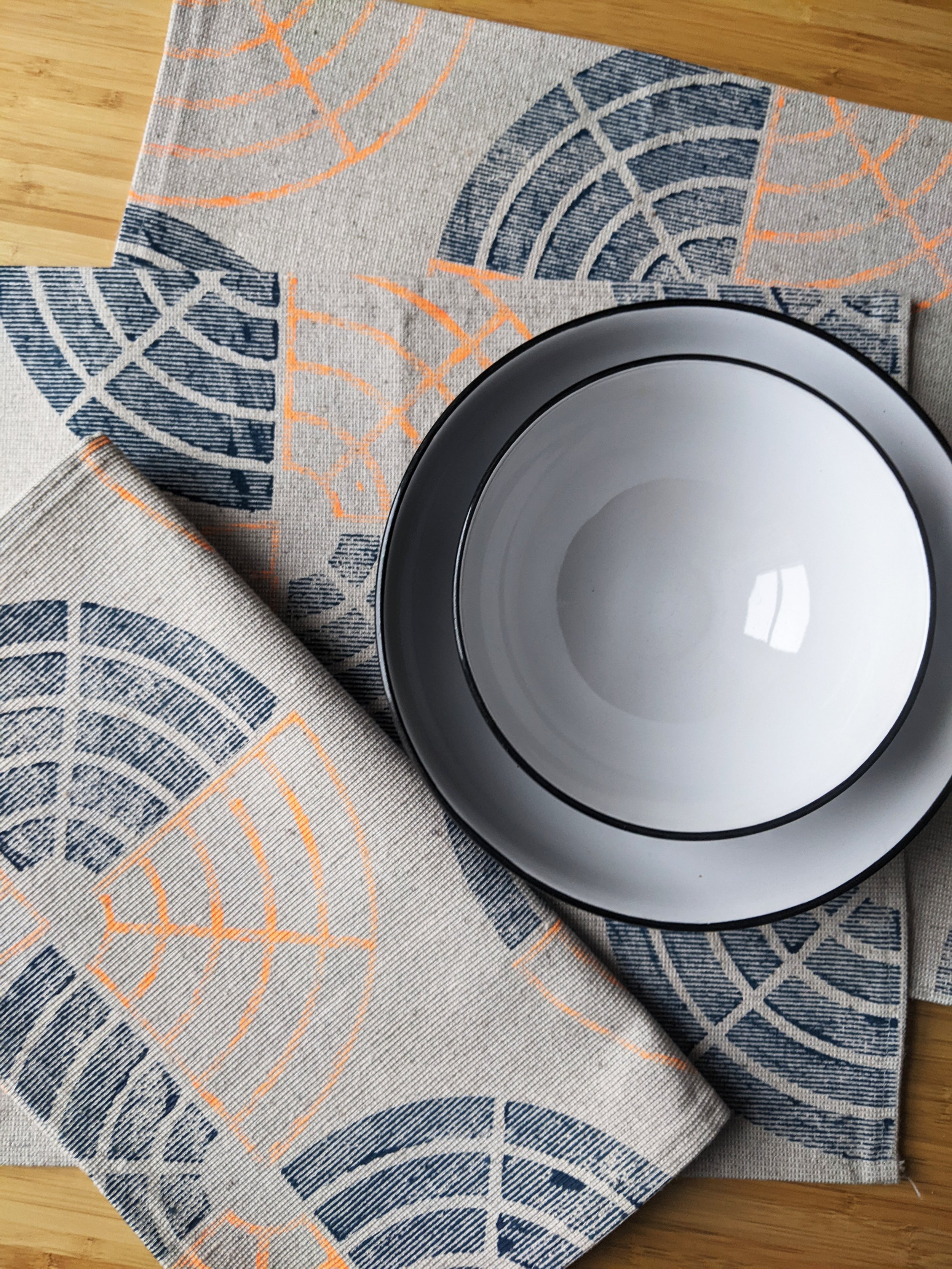 contemporary geometric pattern on fabric place mats in bright kitchen decor scene