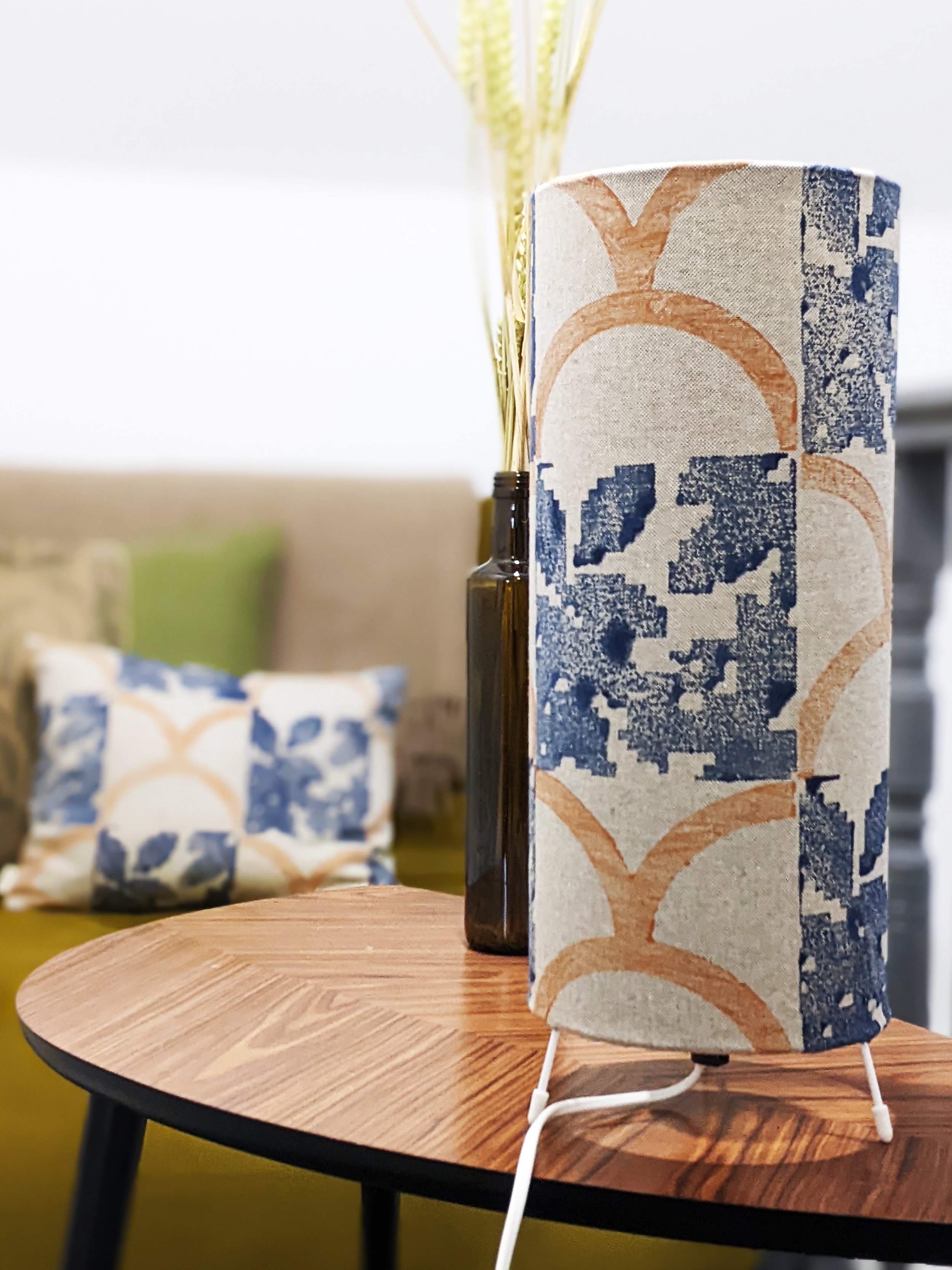boho interior scene with cushions and lamp in deco vintage inspired patterns