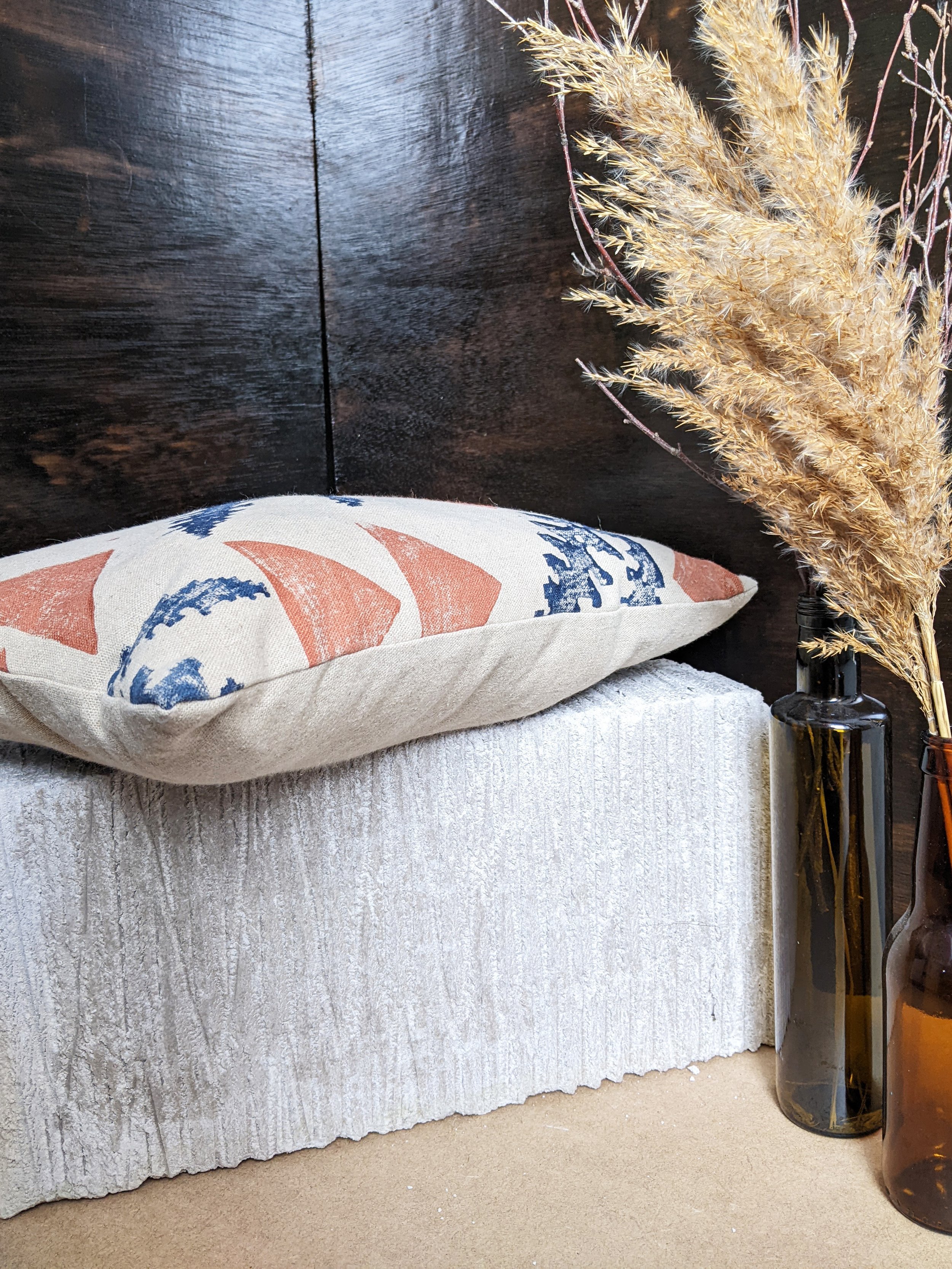 recycled linen cushion with block printed pattern on one side