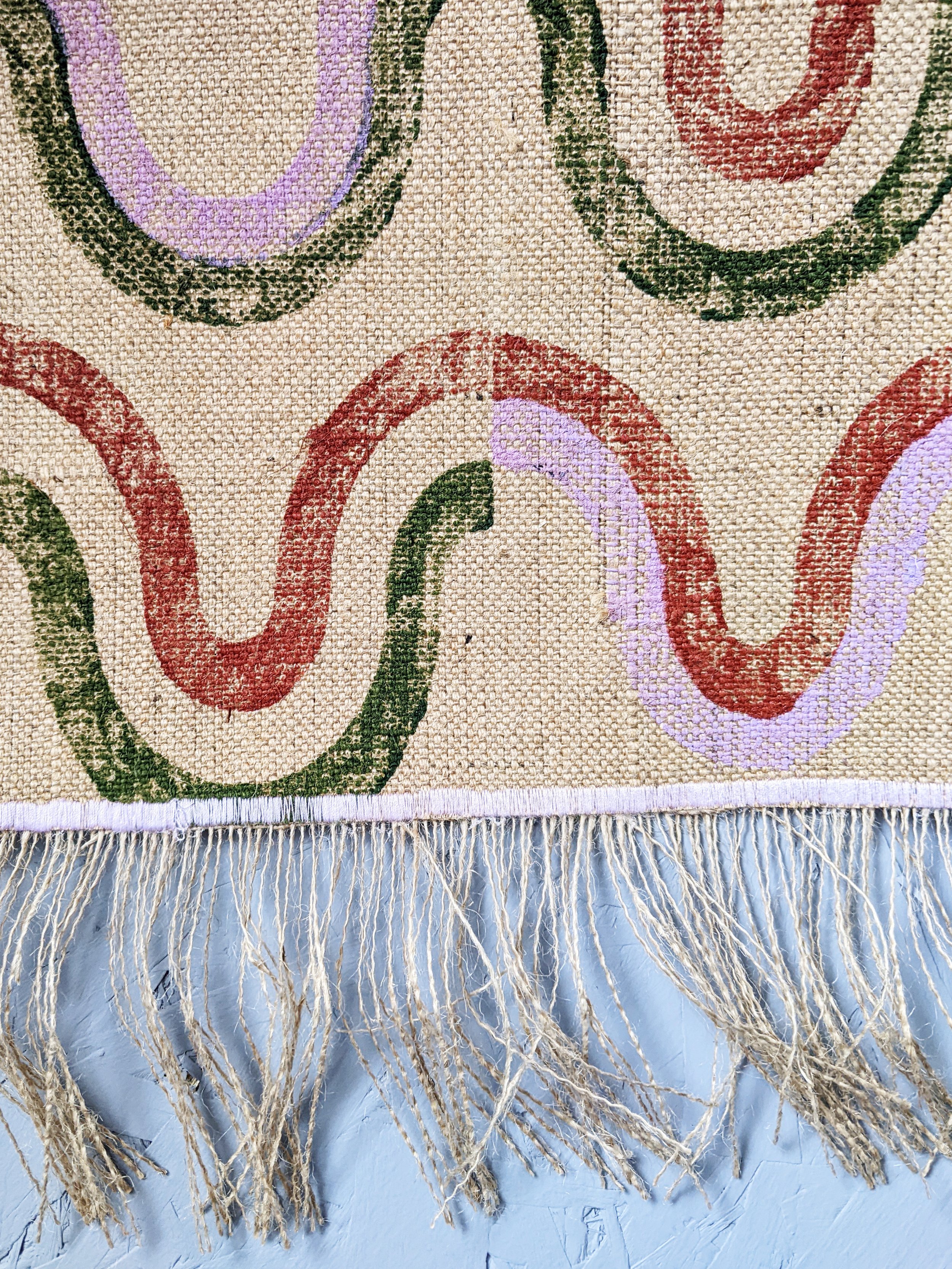close-up detail of hand block printed wave pattern of contemporary runner rug