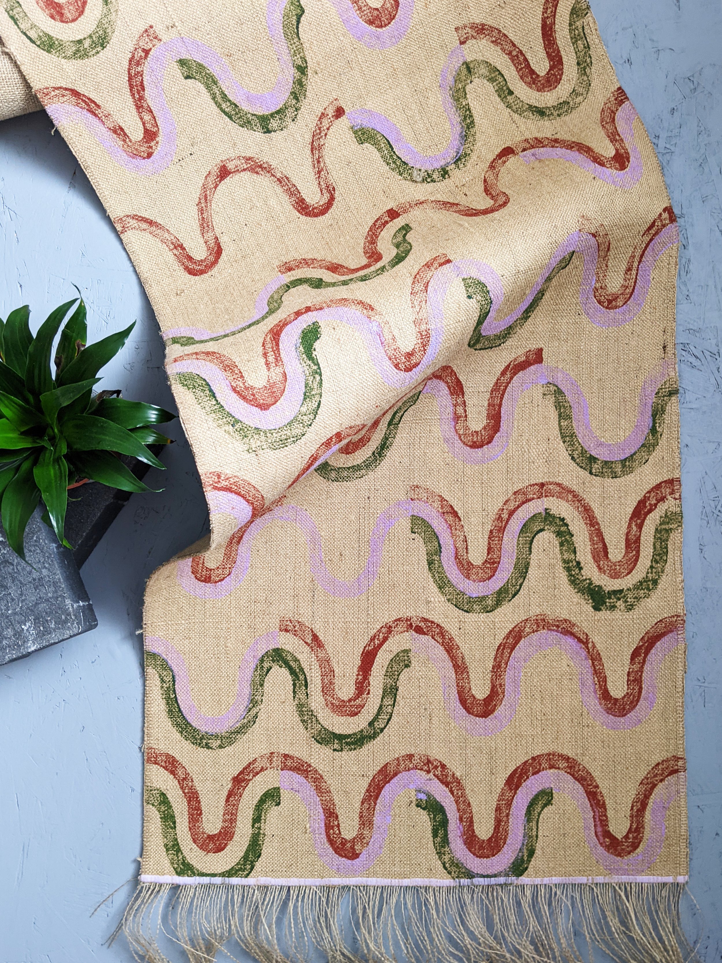 detail of contemporary abstract wave print on studio floor