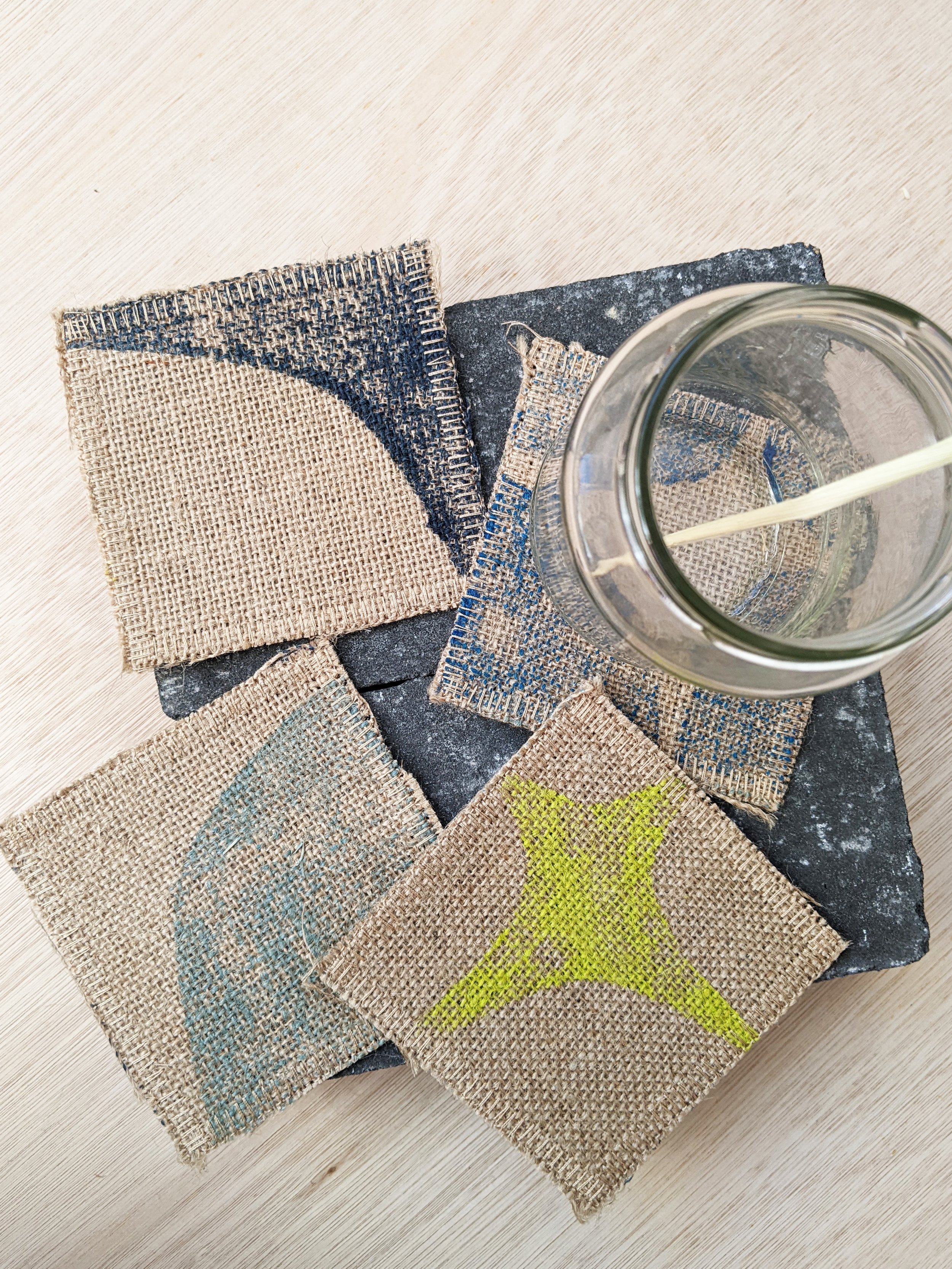 set of coasters made of jute in bright colours