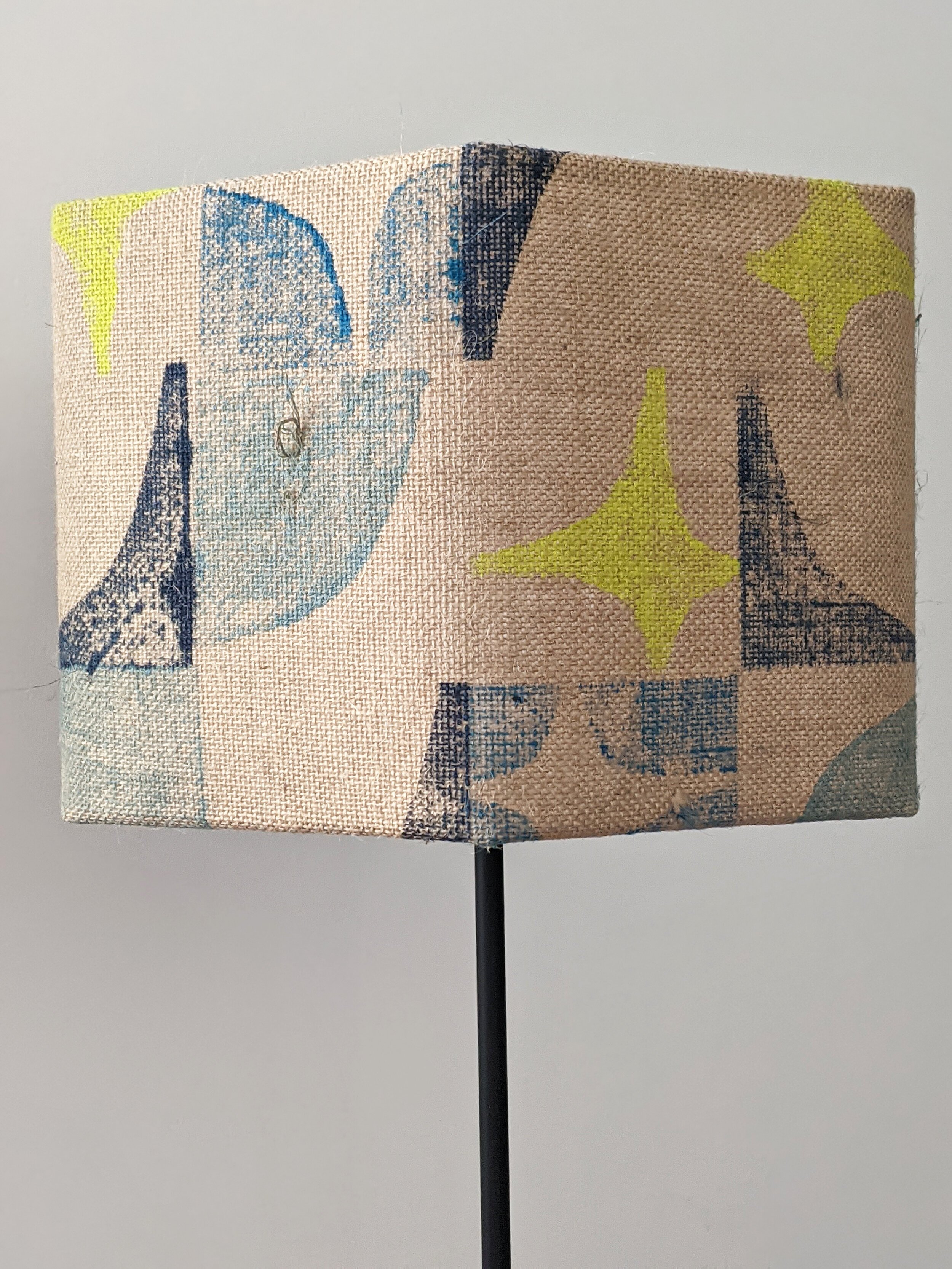 blue-and-yellow-geometric-print-on-hexagonal-lampshade.jpg