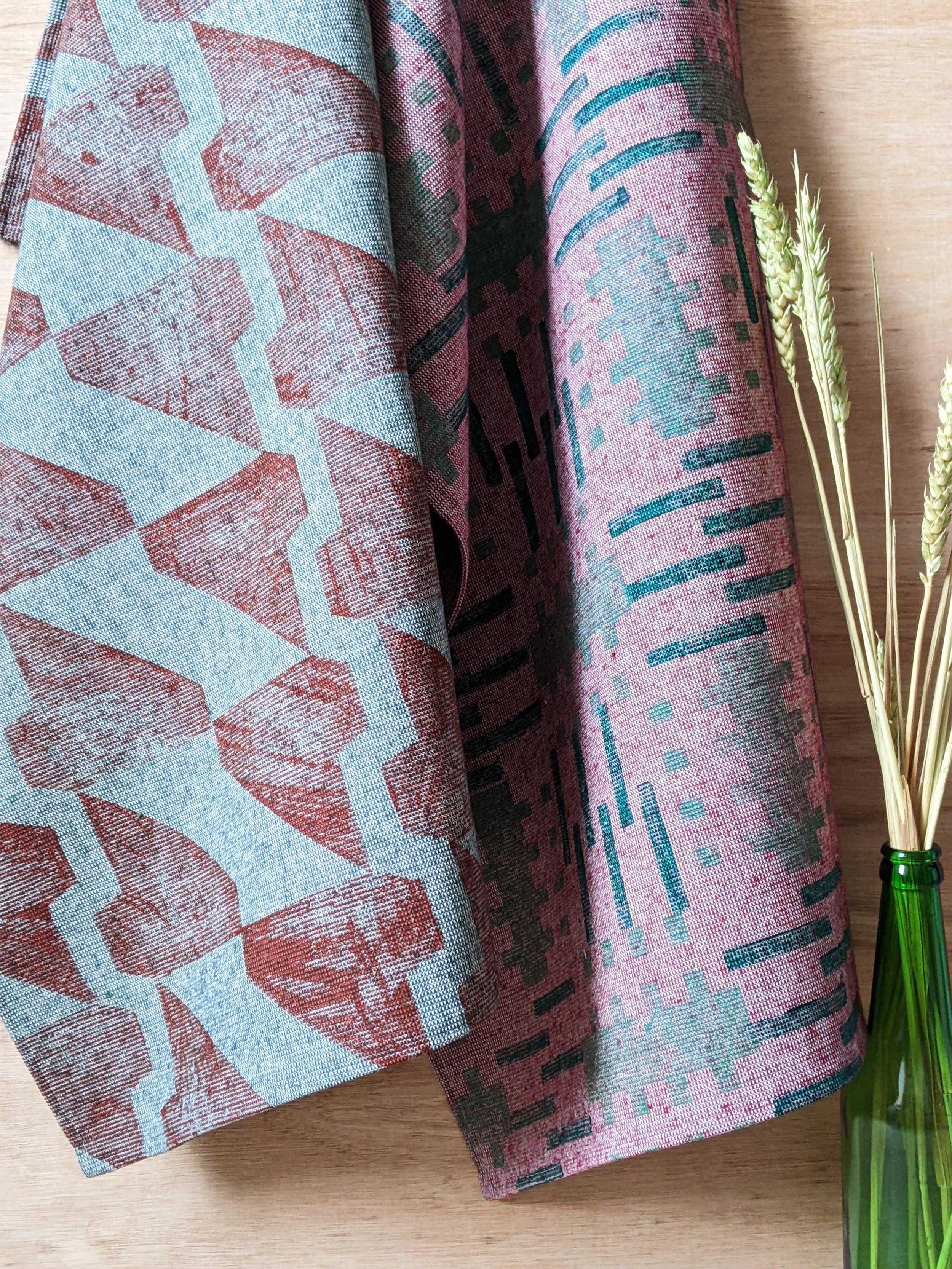 kitchen towels hanging in brutalism inspired abstract patterns