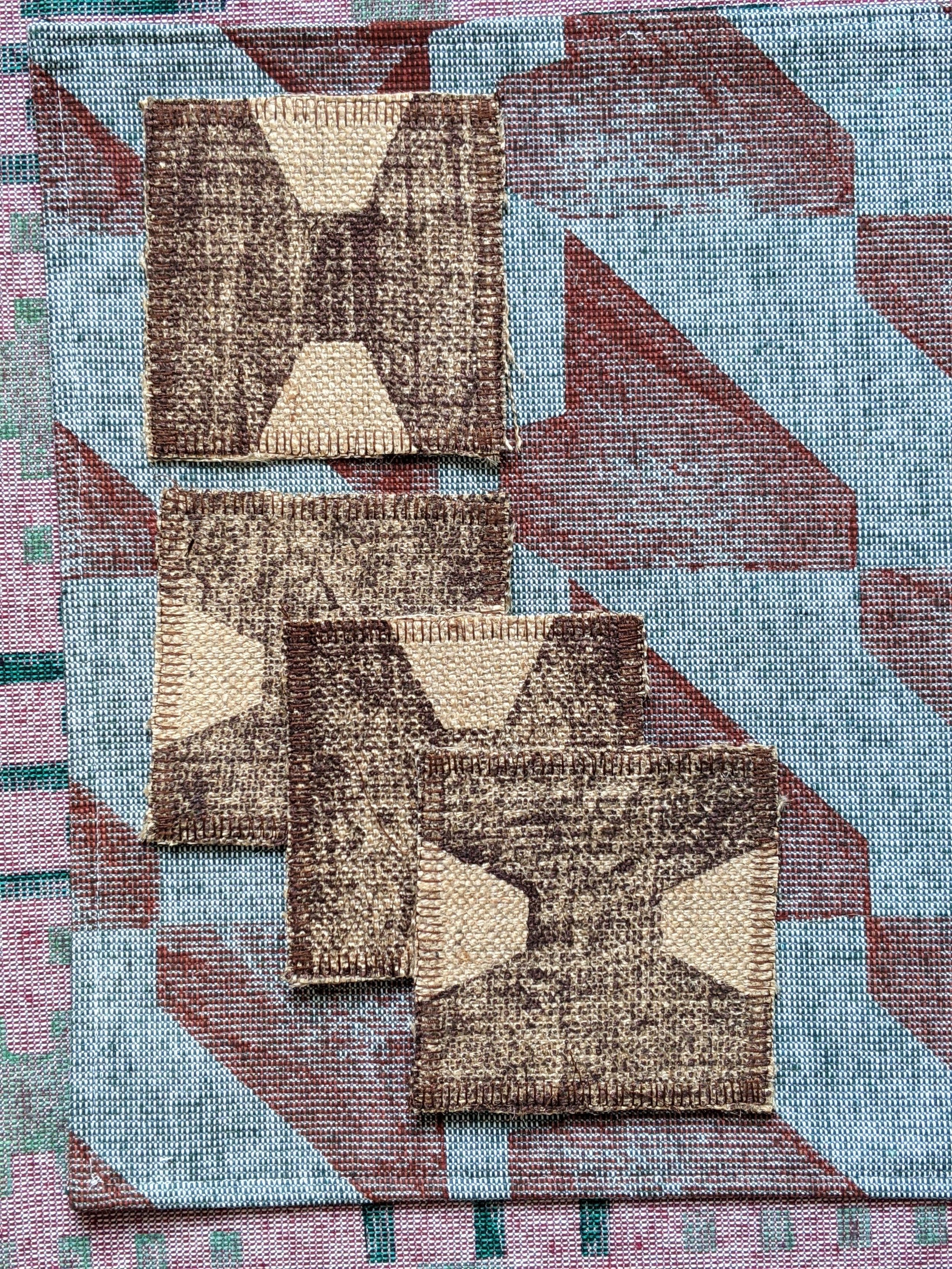 set of four square coasters in warm brown