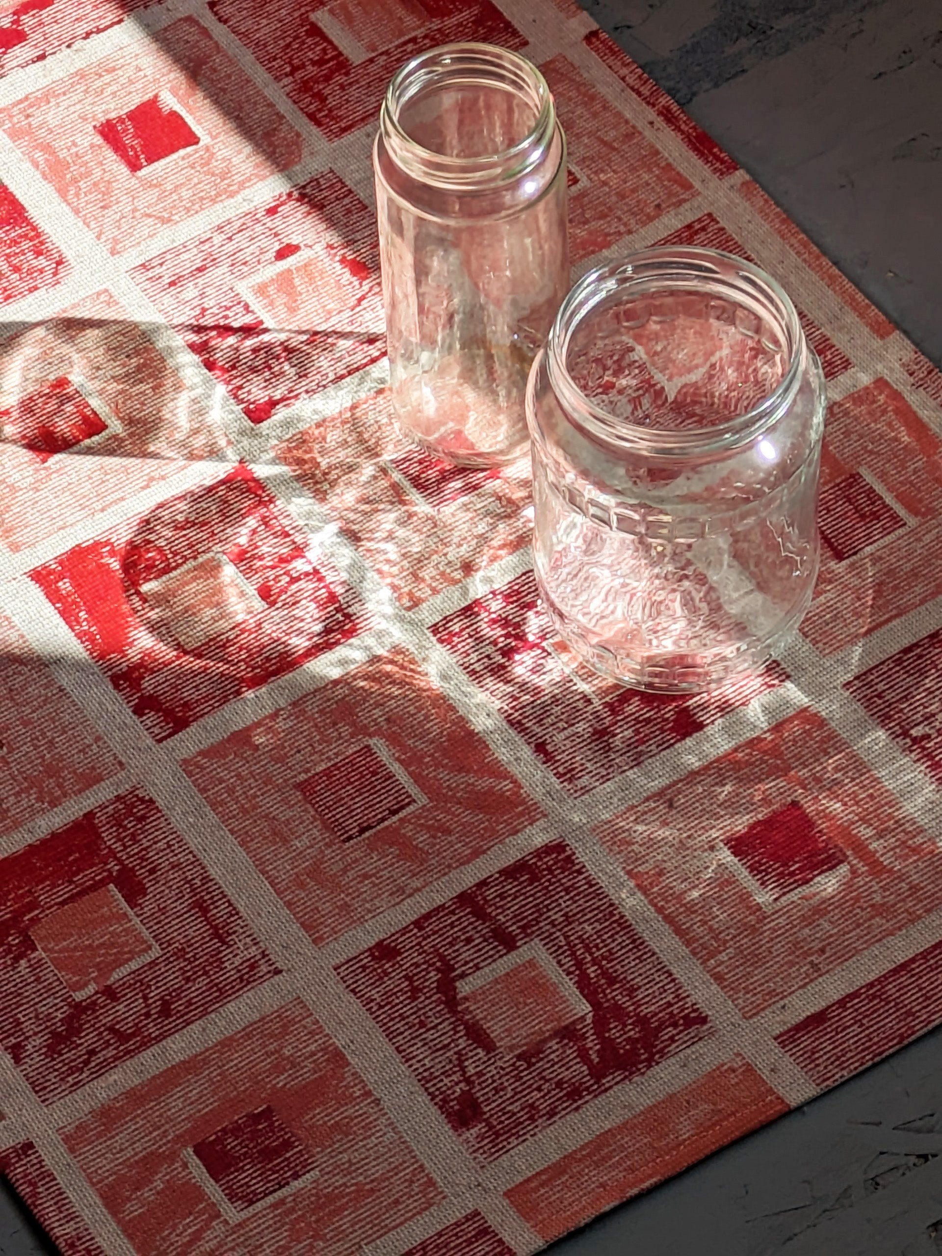 cherry red and blossom pink pattern on teatowel
