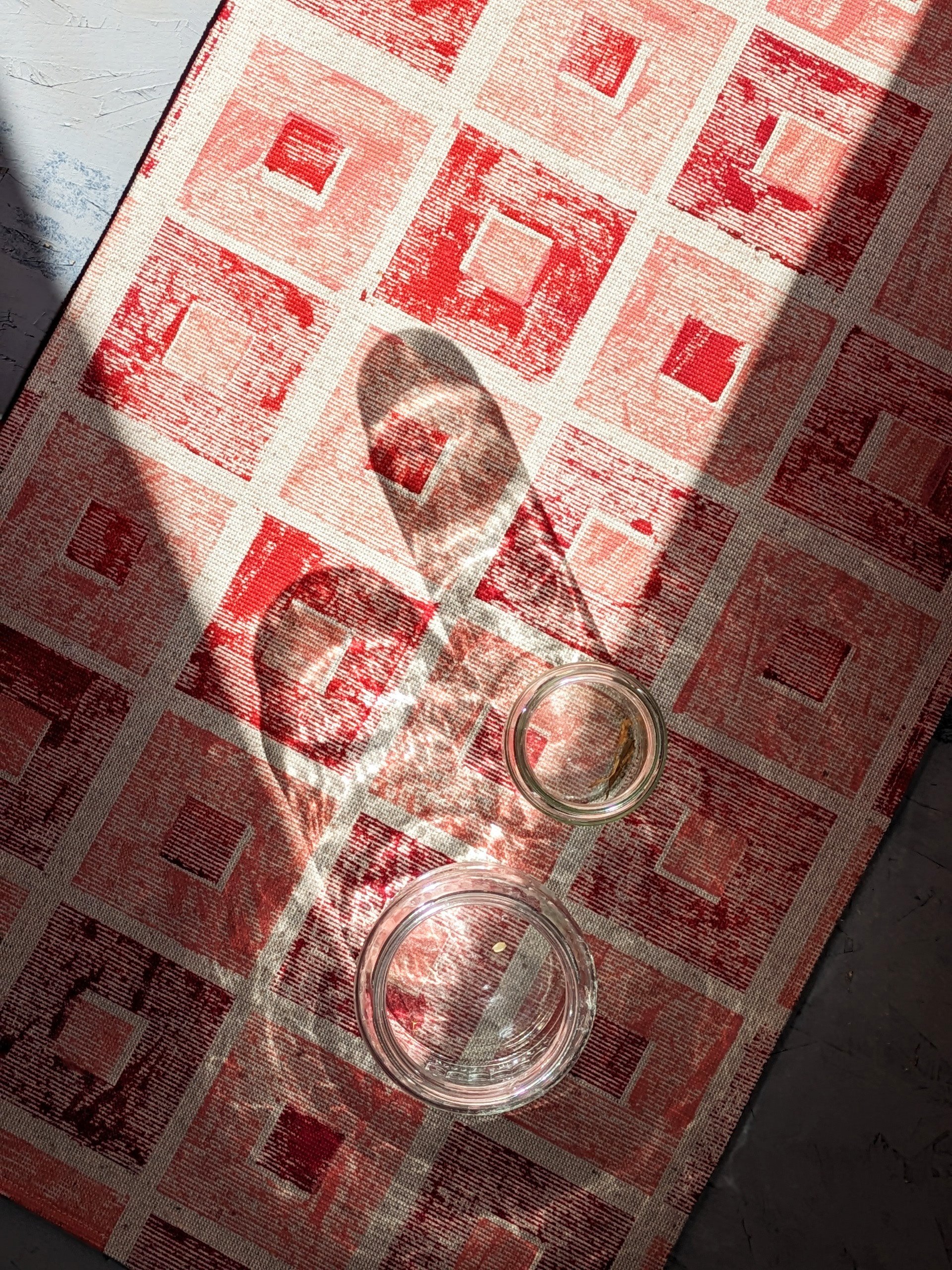 square pattern on decorative kitchen towel with cherry red and blush pink