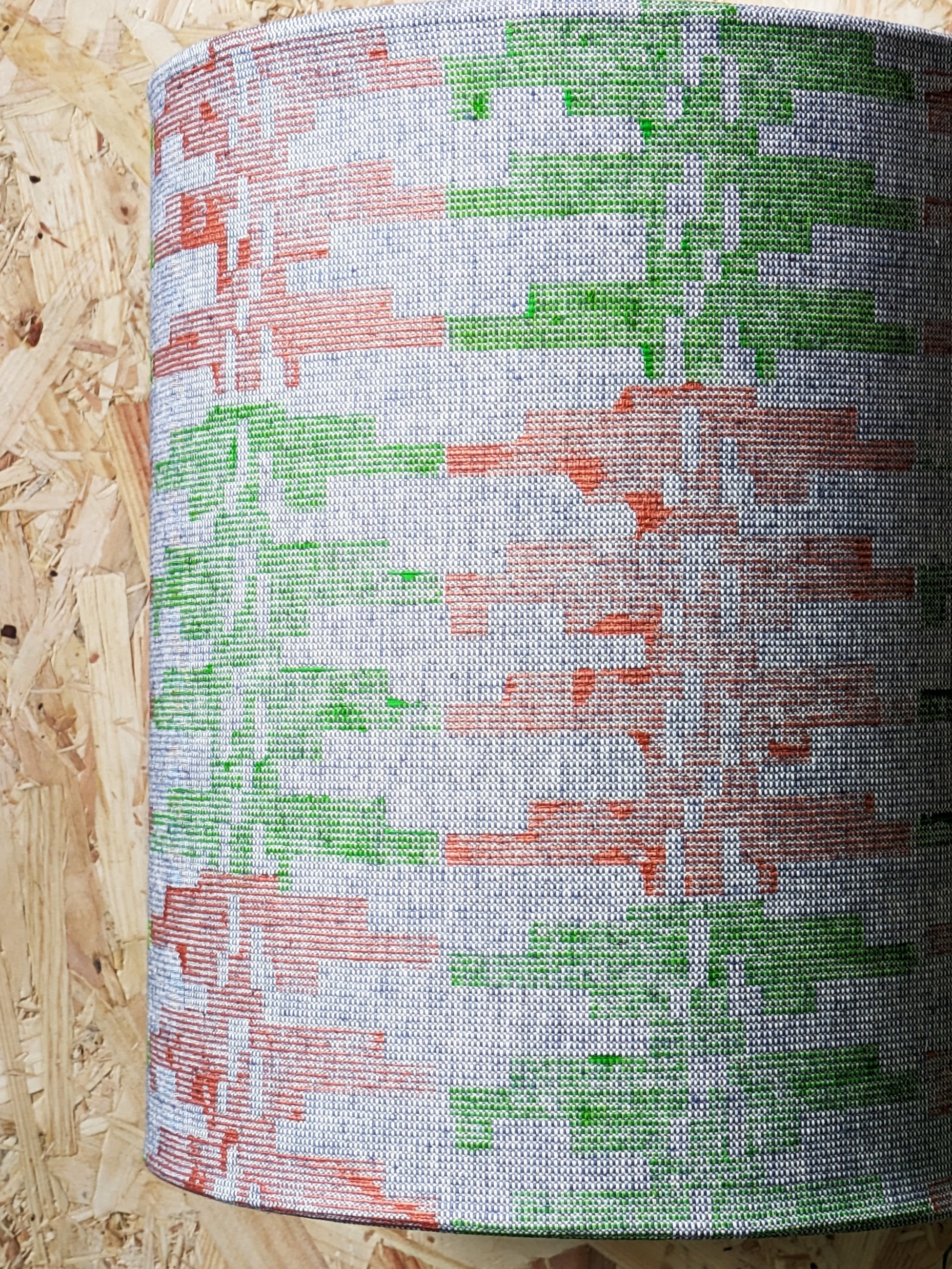 close-up detail of textured fabric and block printed boho pattern on lampshade