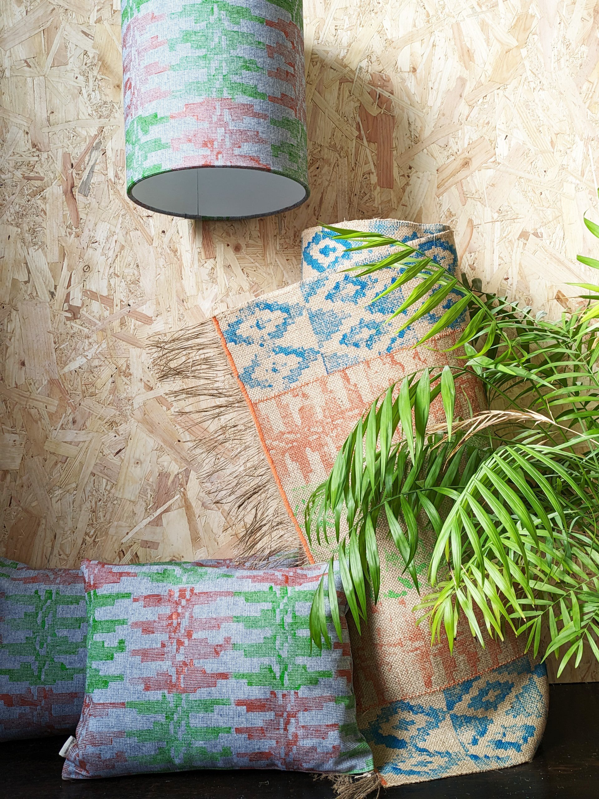 interior scene with travel-inspired geometric block printed pattern