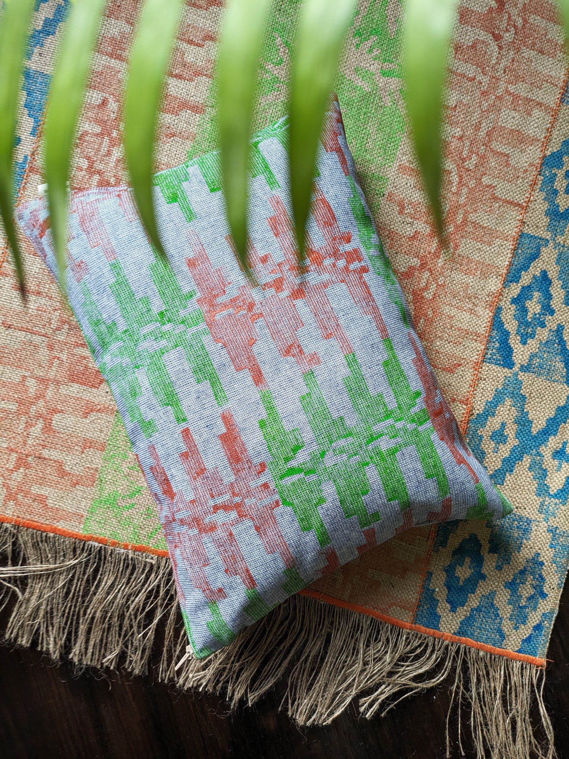 rectangular cushion on printed rug in tribal, travel inspired simple geometric pattern