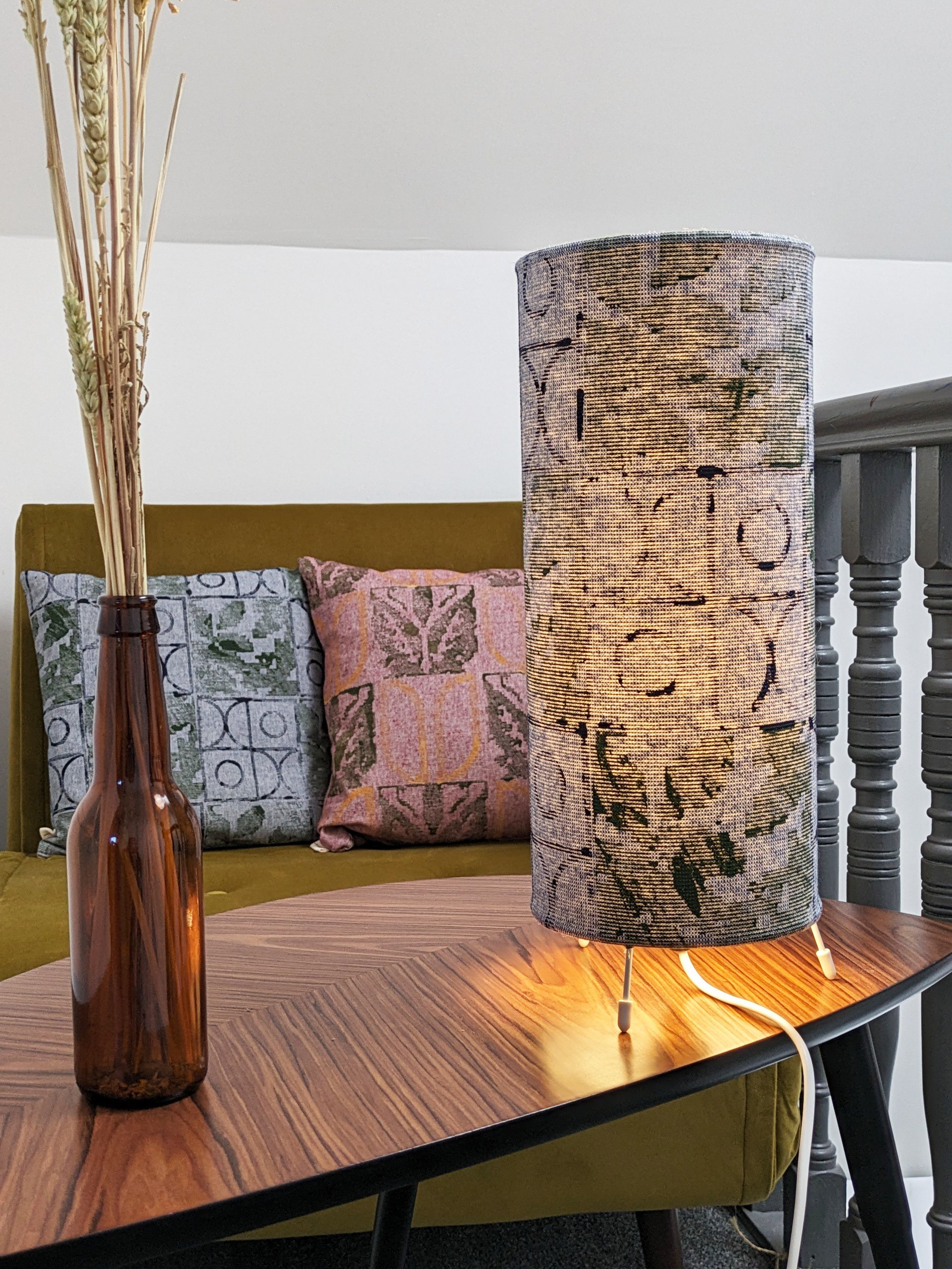 rustic cosy nook with ambient lamp and botanical, tile-inspired pattern